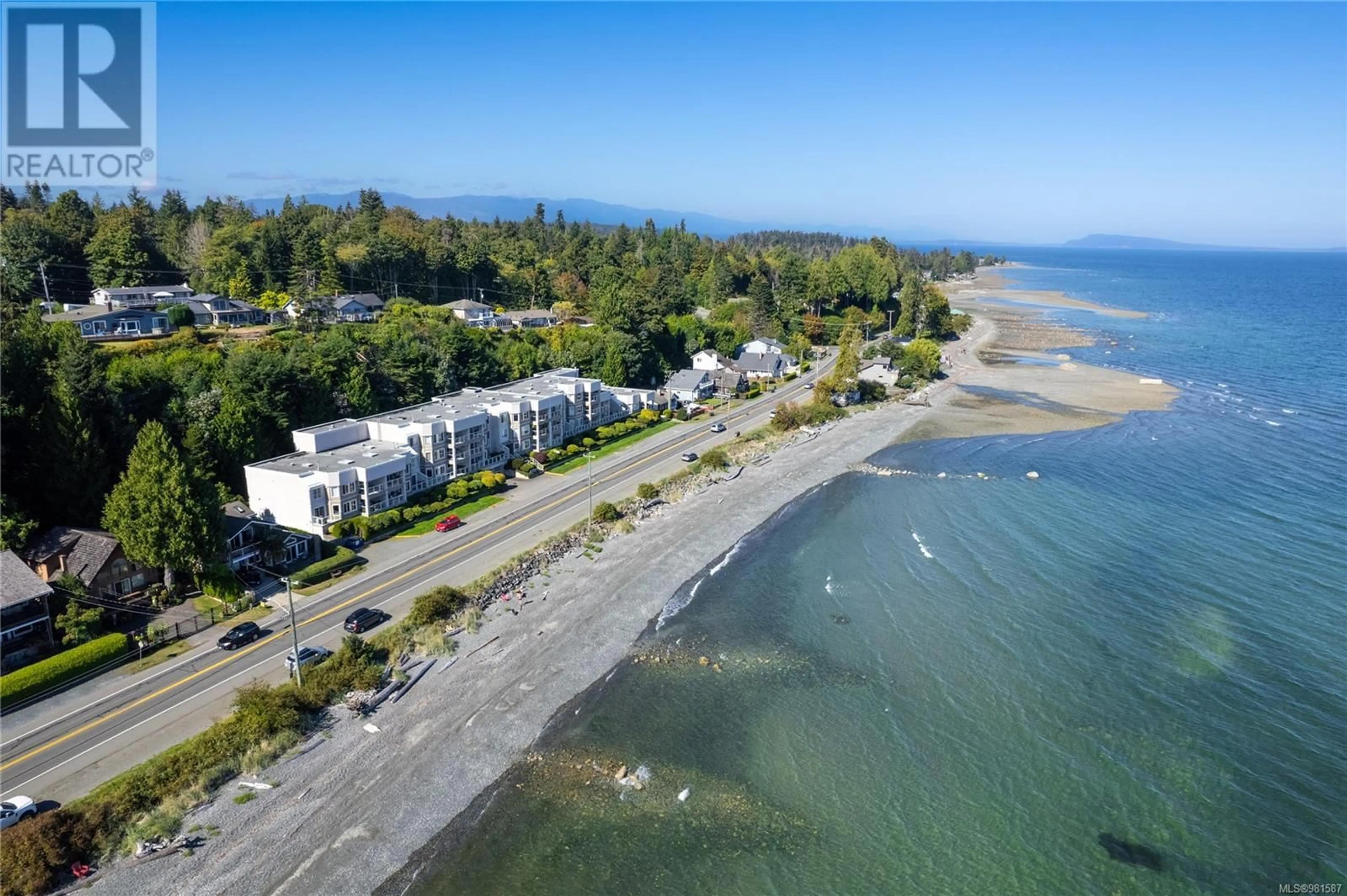 A pic from exterior of the house or condo, the street view for 103 3156 Island Hwy W, Qualicum Beach British Columbia V9K2C6