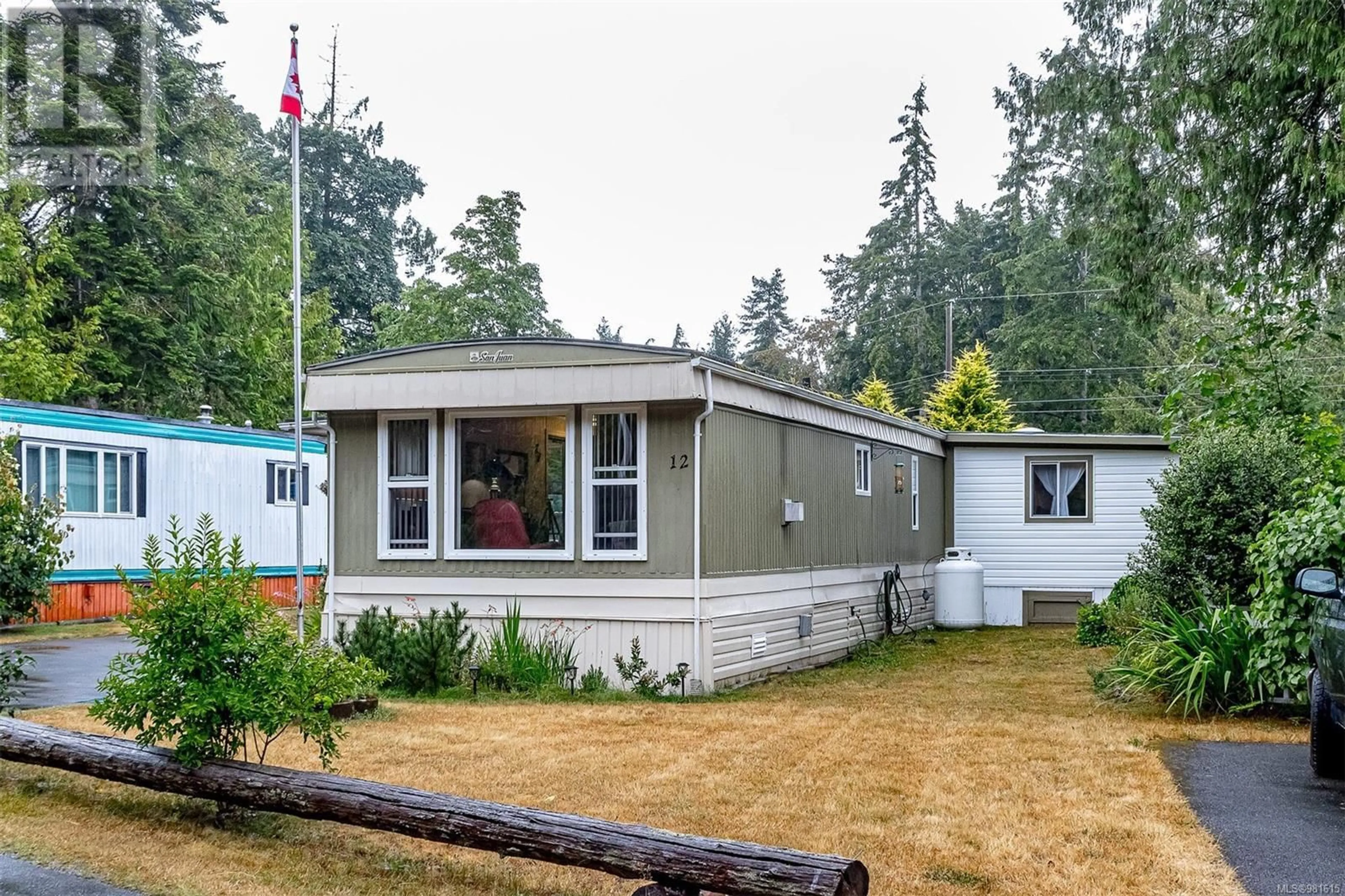 Home with vinyl exterior material for 12 6350 Island Hwy W, Qualicum Beach British Columbia V9K2E5