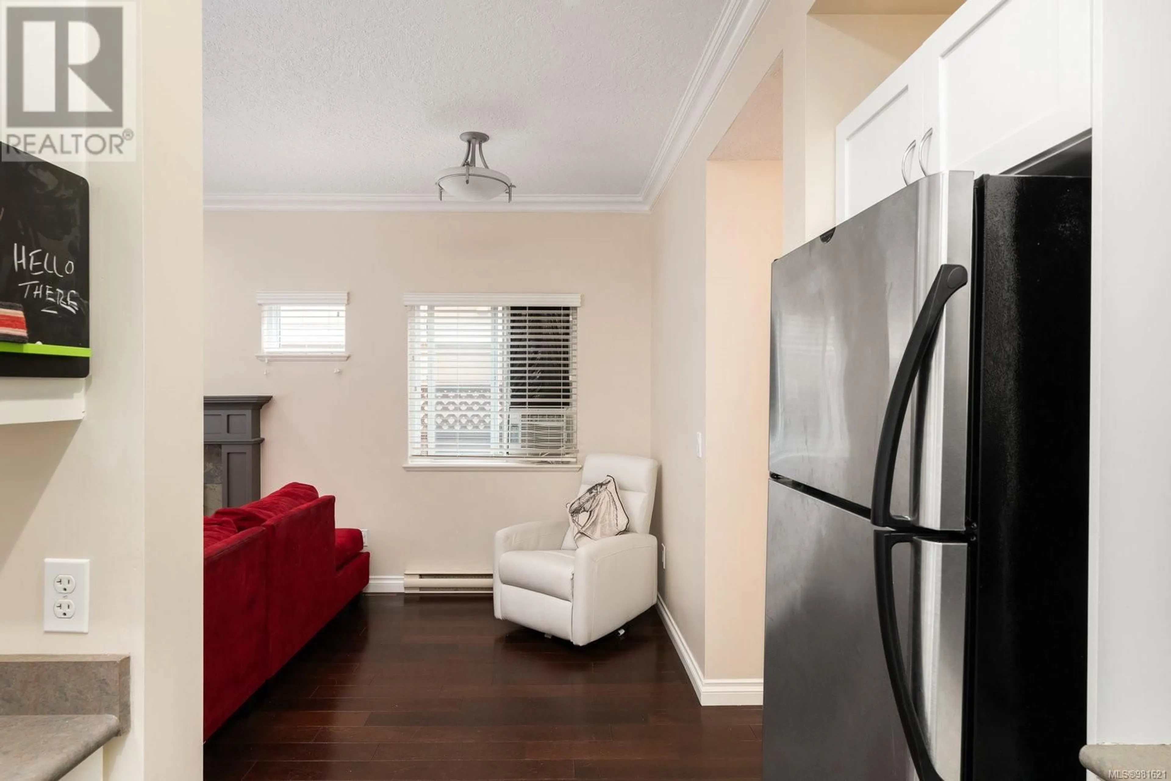 Living room, wood floors for 975 Huckleberry Terr, Langford British Columbia V9C0A7