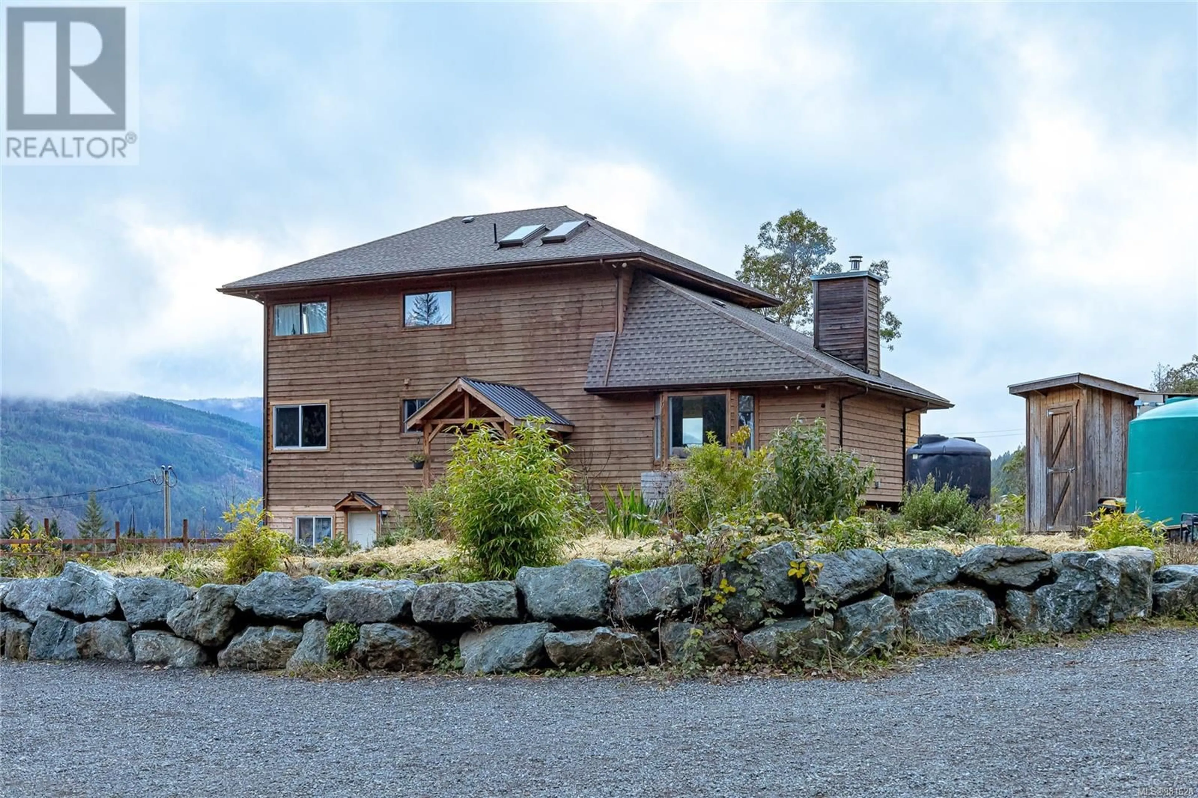 A pic from outside/outdoor area/front of a property/back of a property/a pic from drone, forest/trees view for 3113 RENFREW ROAD, Shawnigan Lake British Columbia V0R2W1