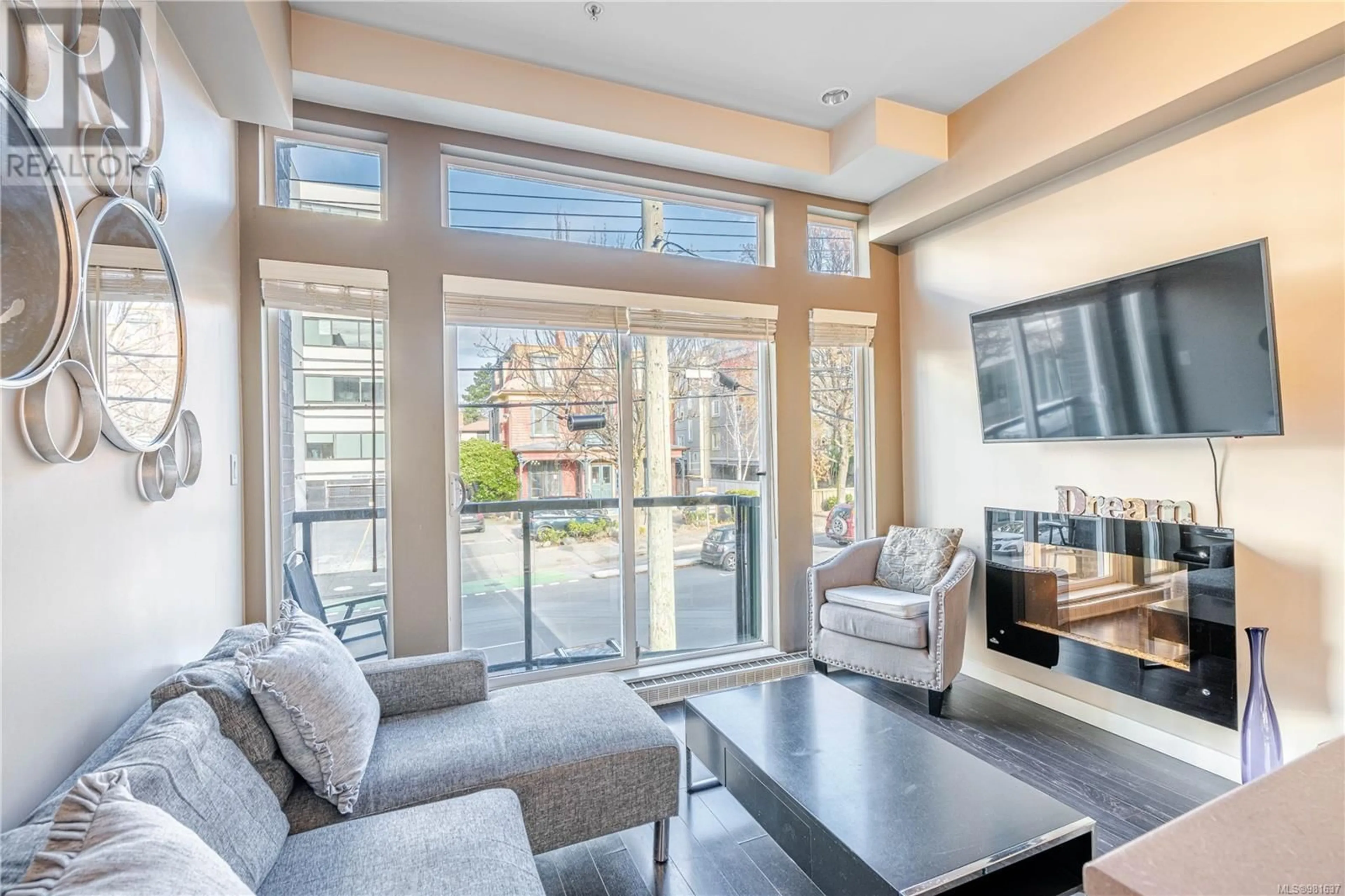 Living room, wood floors for 203 1121 Fort St, Victoria British Columbia V8V3K9