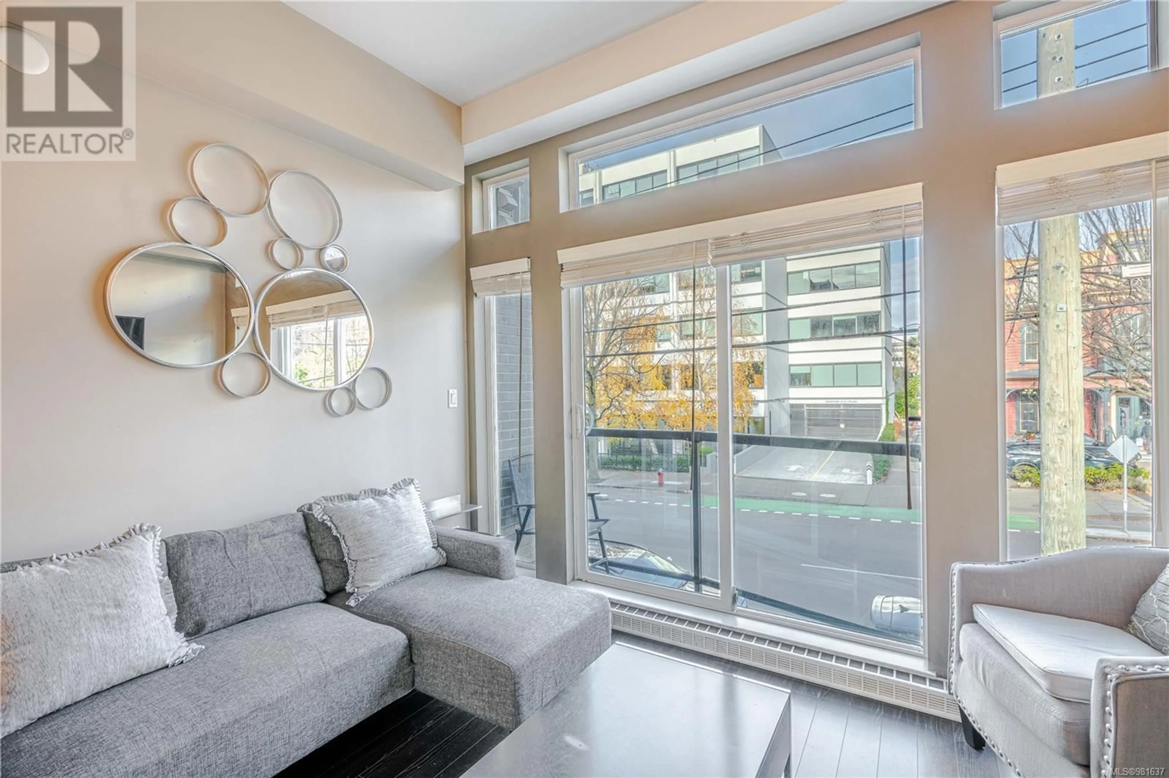 Living room, wood floors for 203 1121 Fort St, Victoria British Columbia V8V3K9