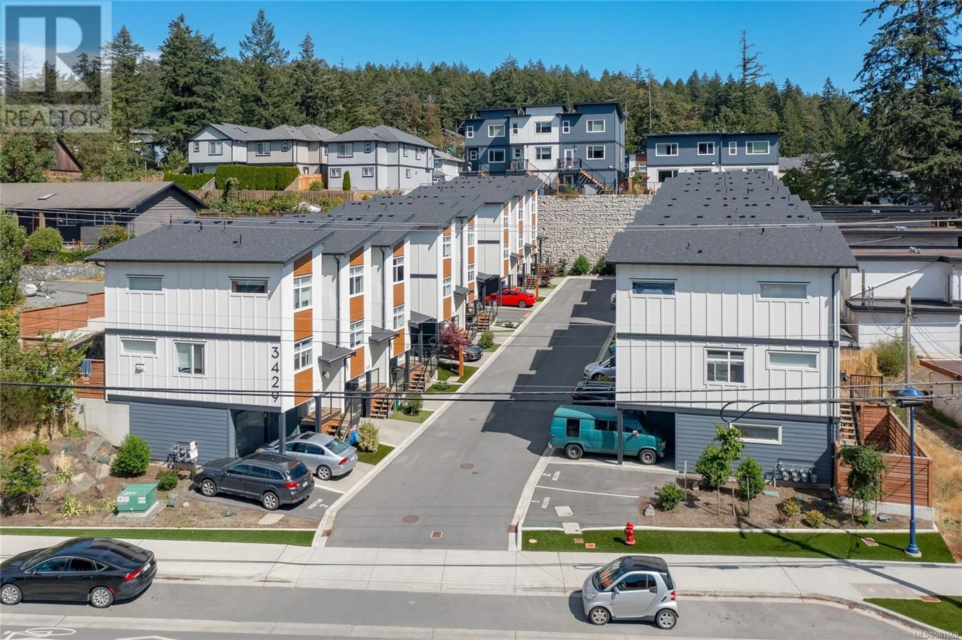 A pic from exterior of the house or condo, the street view for 113 3429 Happy Valley Rd, Langford British Columbia V9C2X9