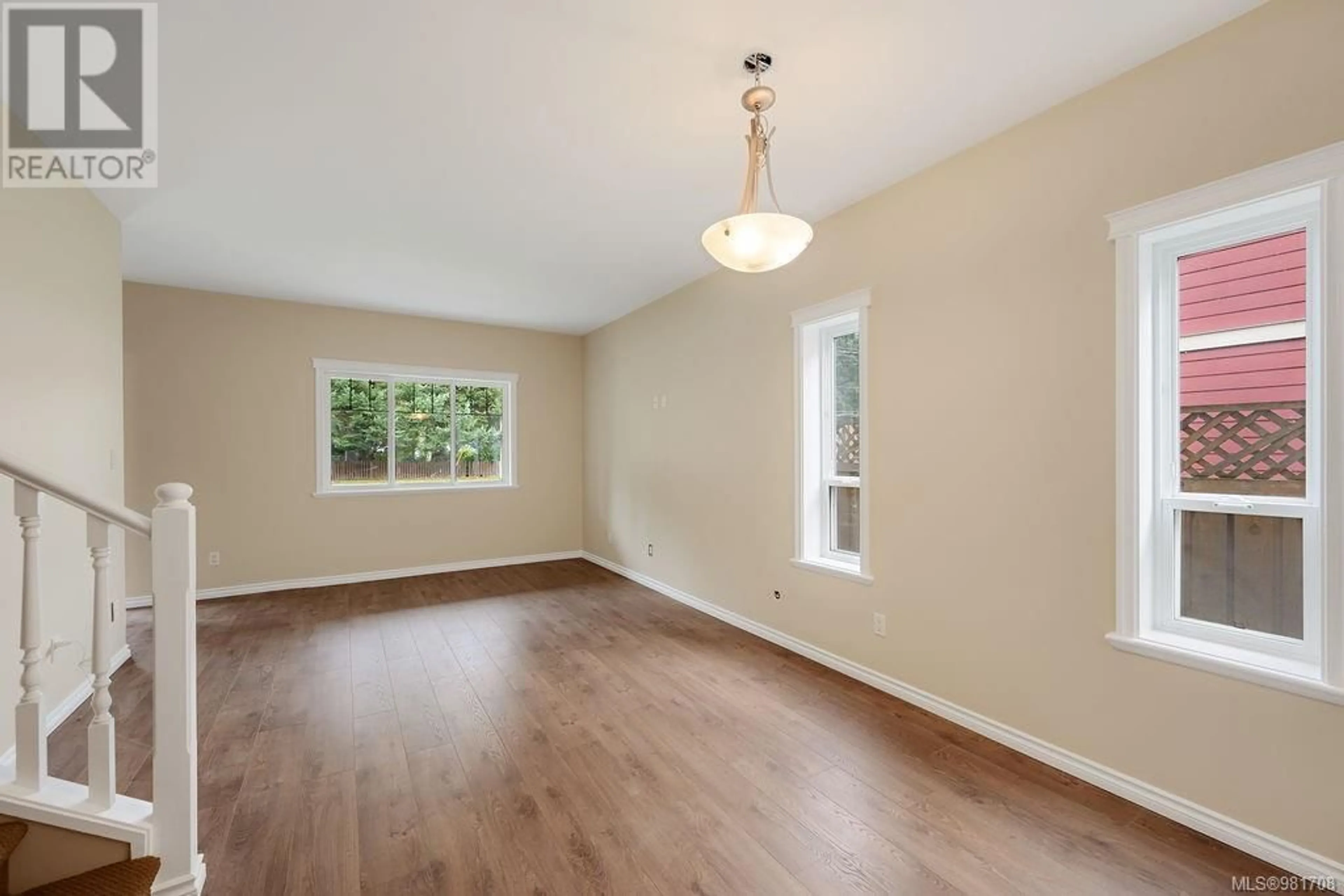 A pic of a room, wood floors for 615 Treanor Ave, Langford British Columbia V9B3H6