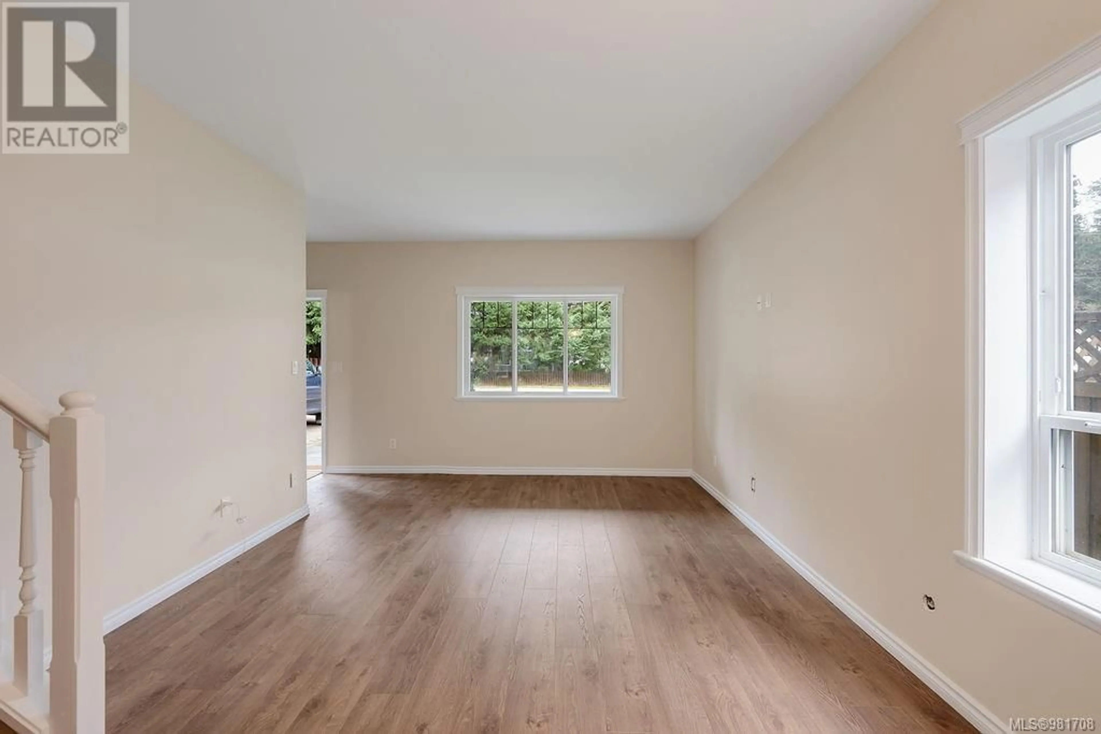 A pic of a room, wood floors for 615 Treanor Ave, Langford British Columbia V9B3H6