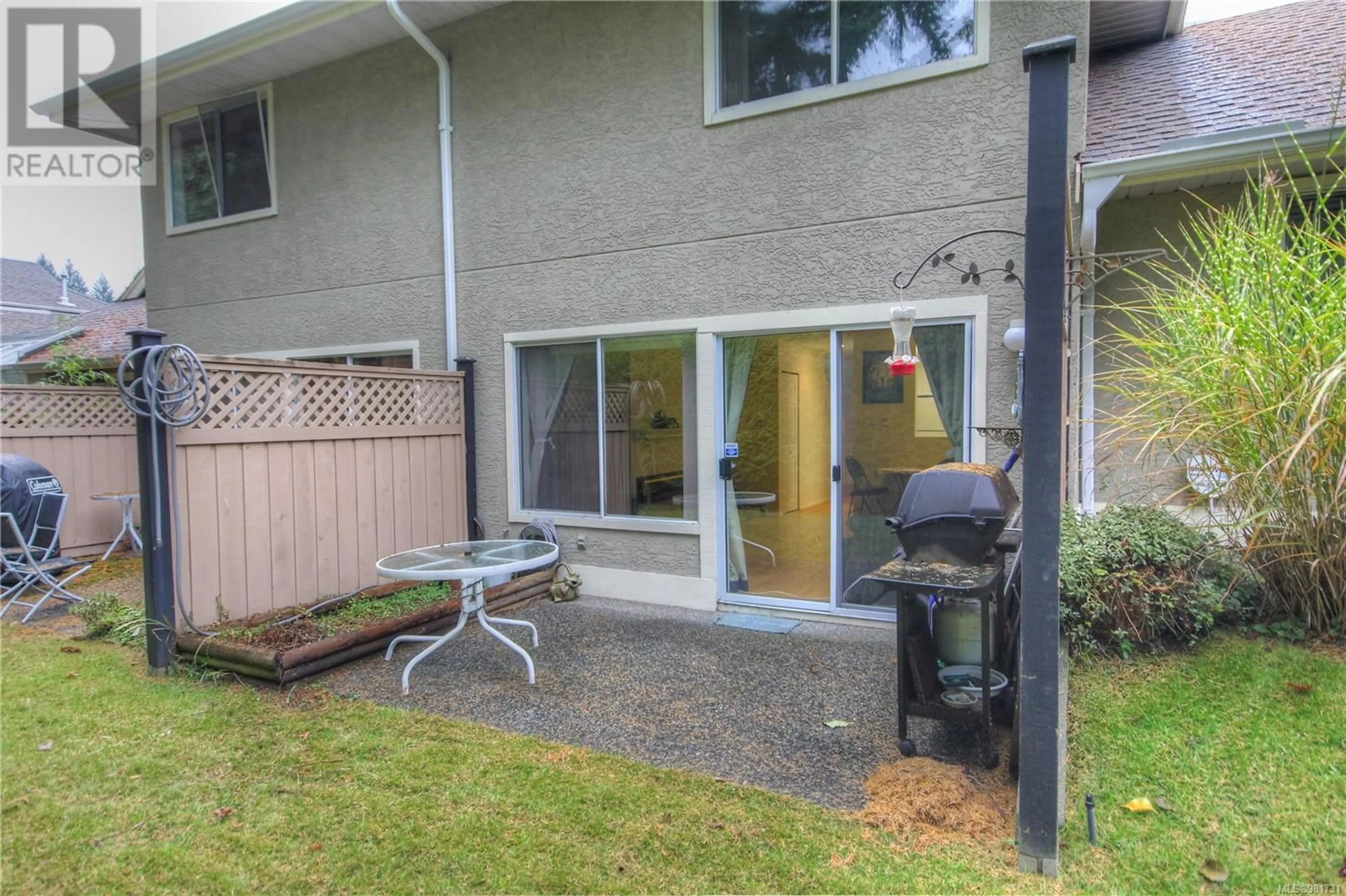 Patio, the fenced backyard for 6033 Pleasant Valley Way, Nanaimo British Columbia V9T6E7