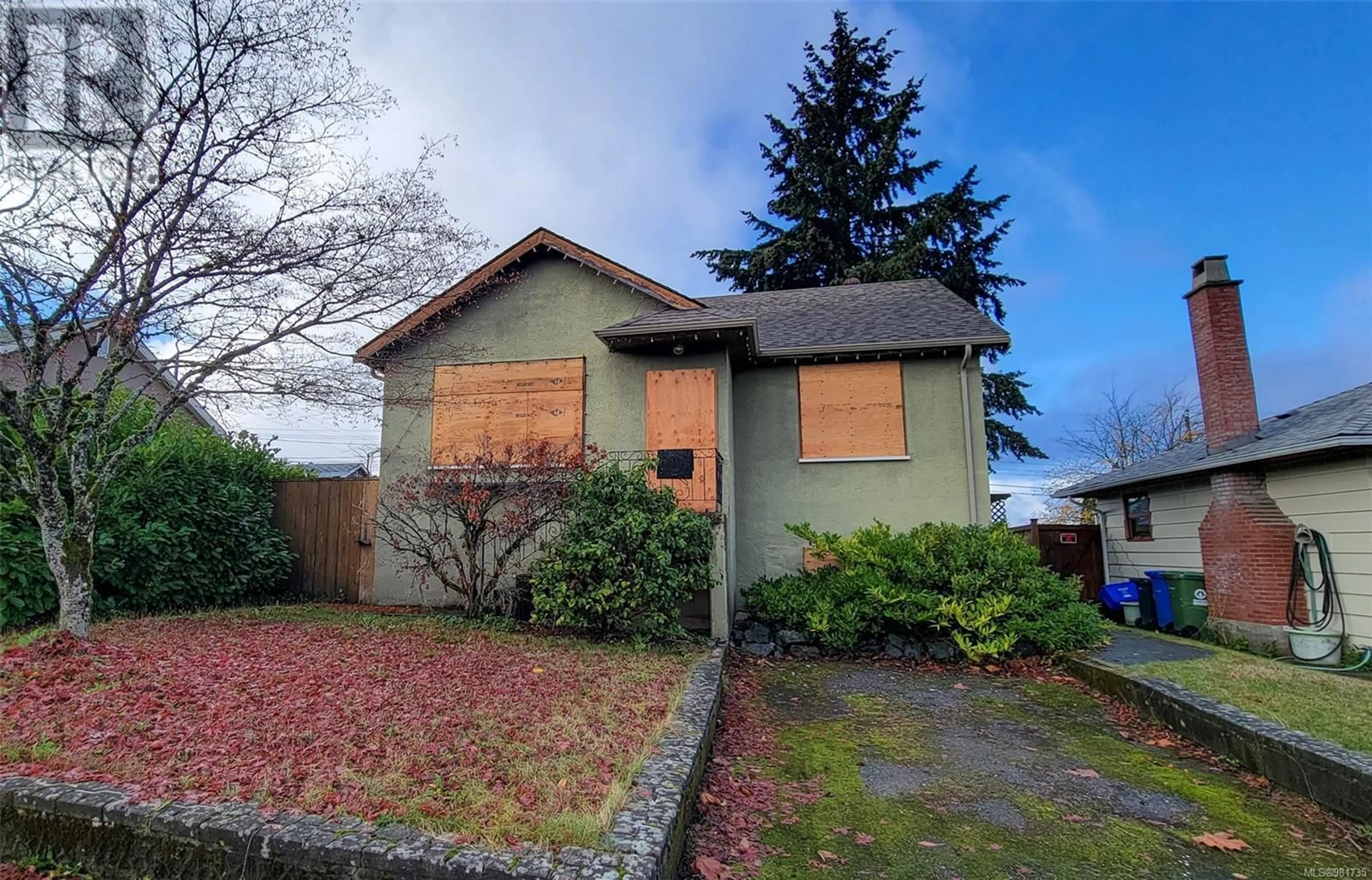 Frontside or backside of a home, the fenced backyard for 3944 6th Ave, Port Alberni British Columbia V9Y4M4