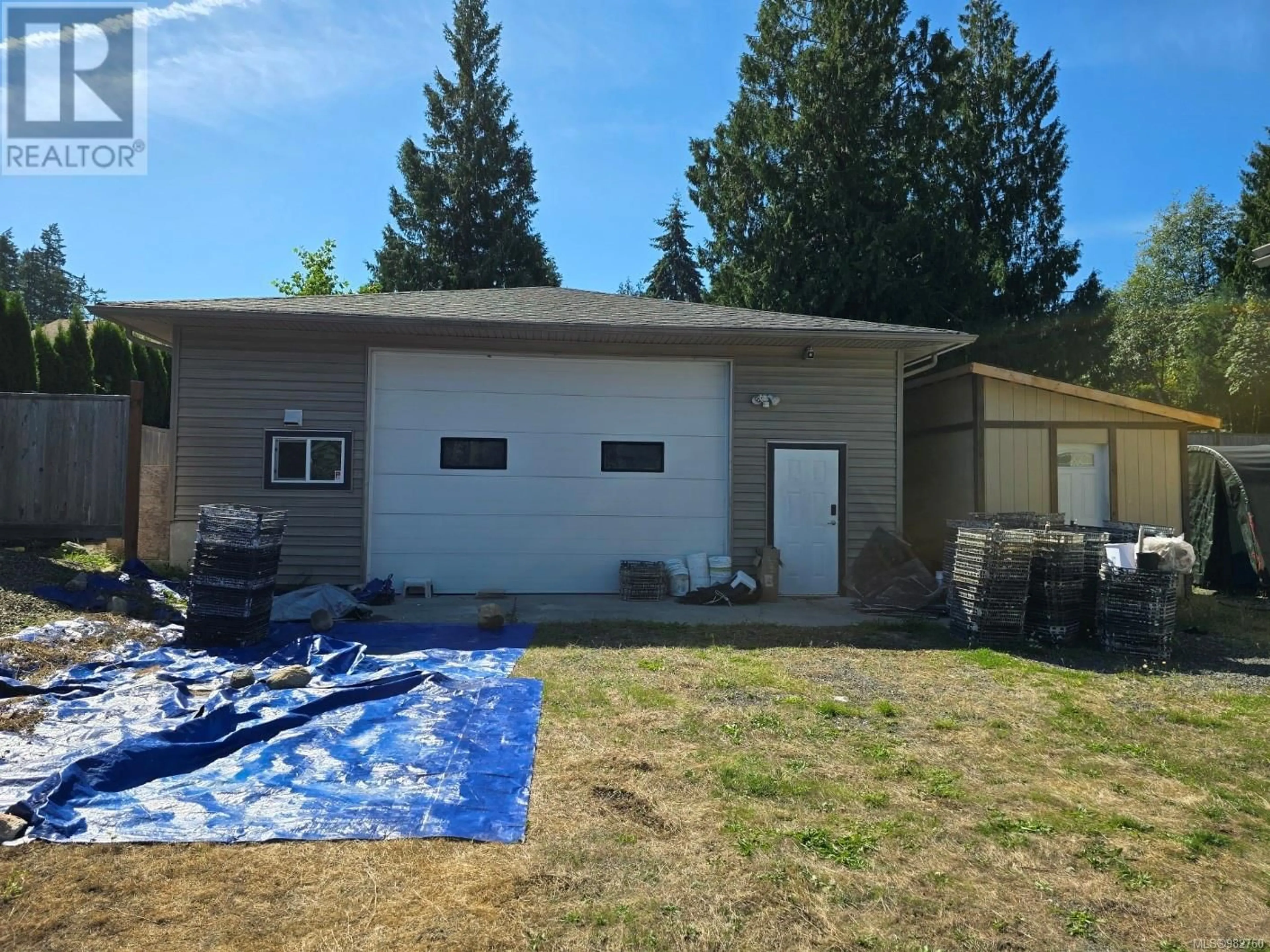 Frontside or backside of a home, the front or back of building for 4594 Berbers Dr, Bowser British Columbia V0R1G0