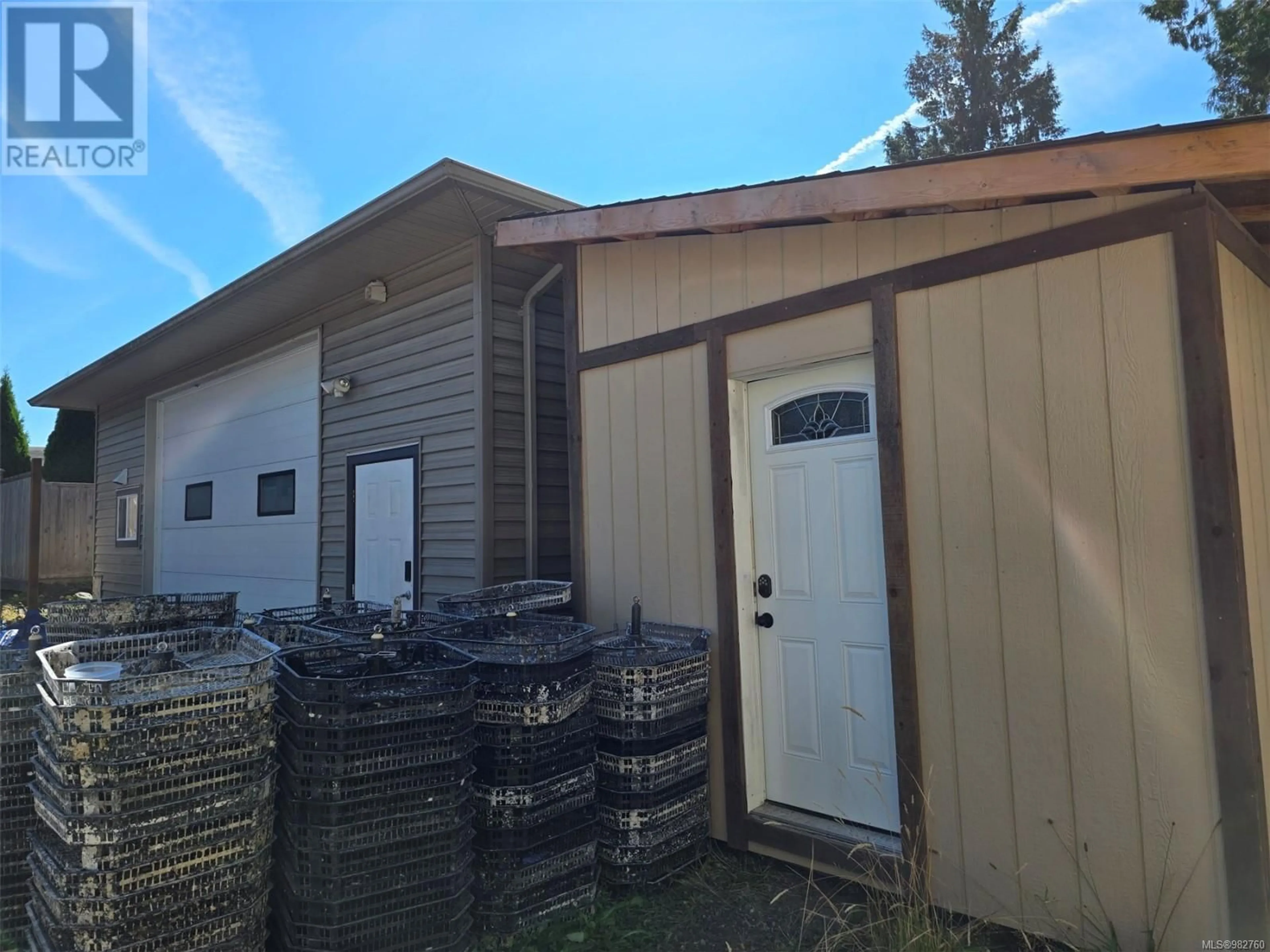 Frontside or backside of a home, the front or back of building for 4594 Berbers Dr, Bowser British Columbia V0R1G0