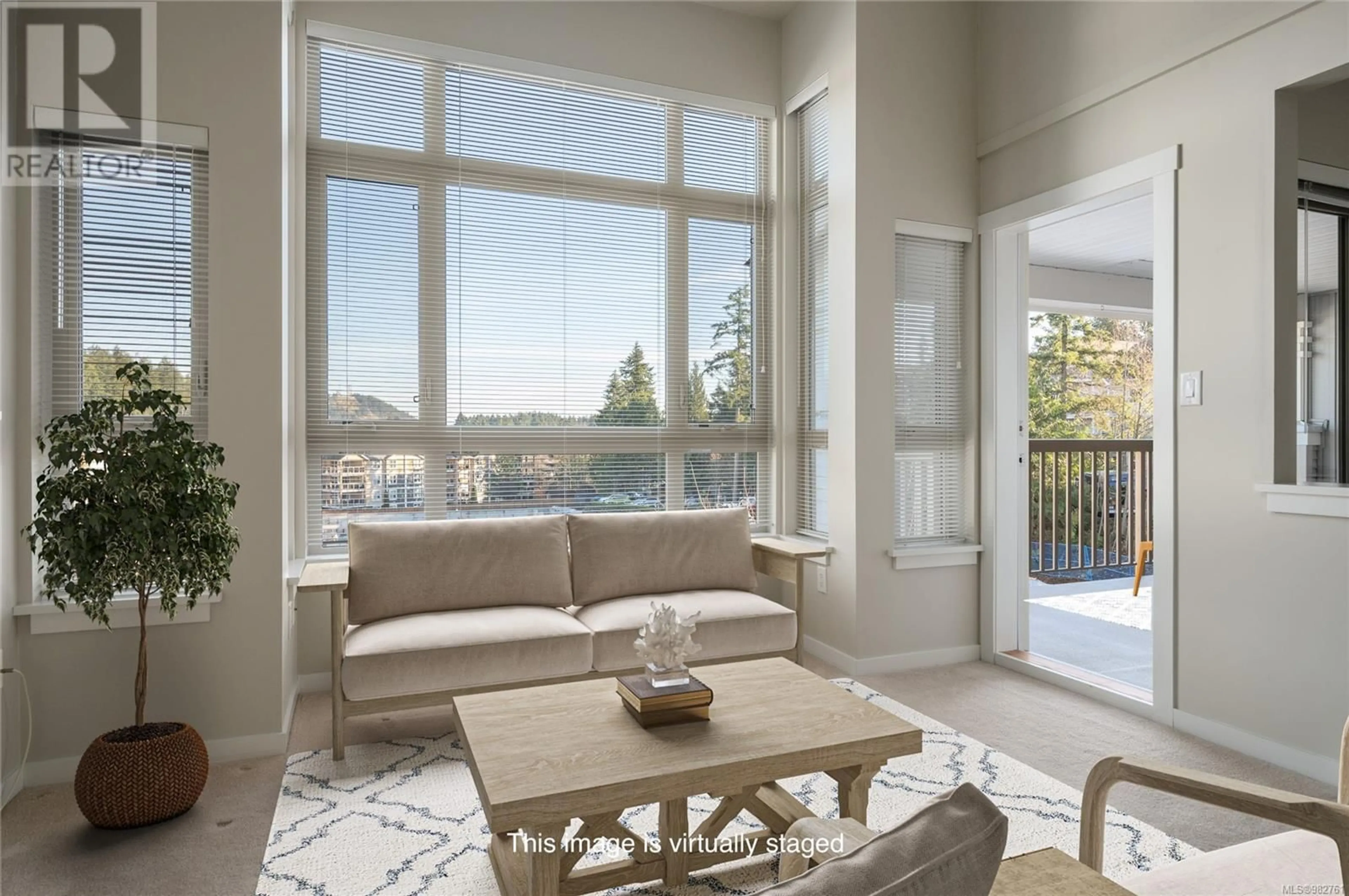 Living room, wood floors for 410 5670 Edgewater Lane, Nanaimo British Columbia V9T6K1