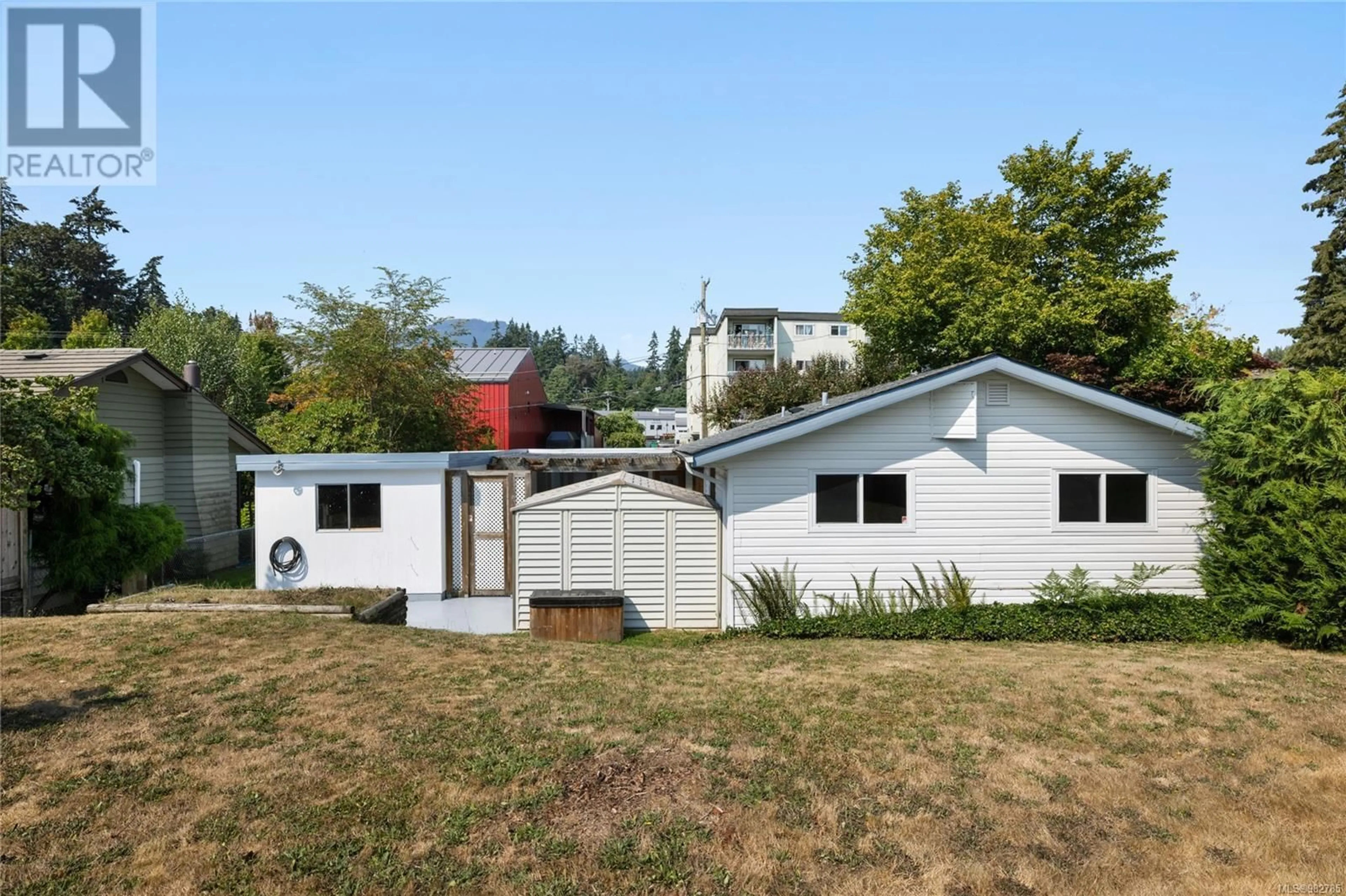 Frontside or backside of a home, the fenced backyard for 9877 Daniel St, Chemainus British Columbia V0R1K1