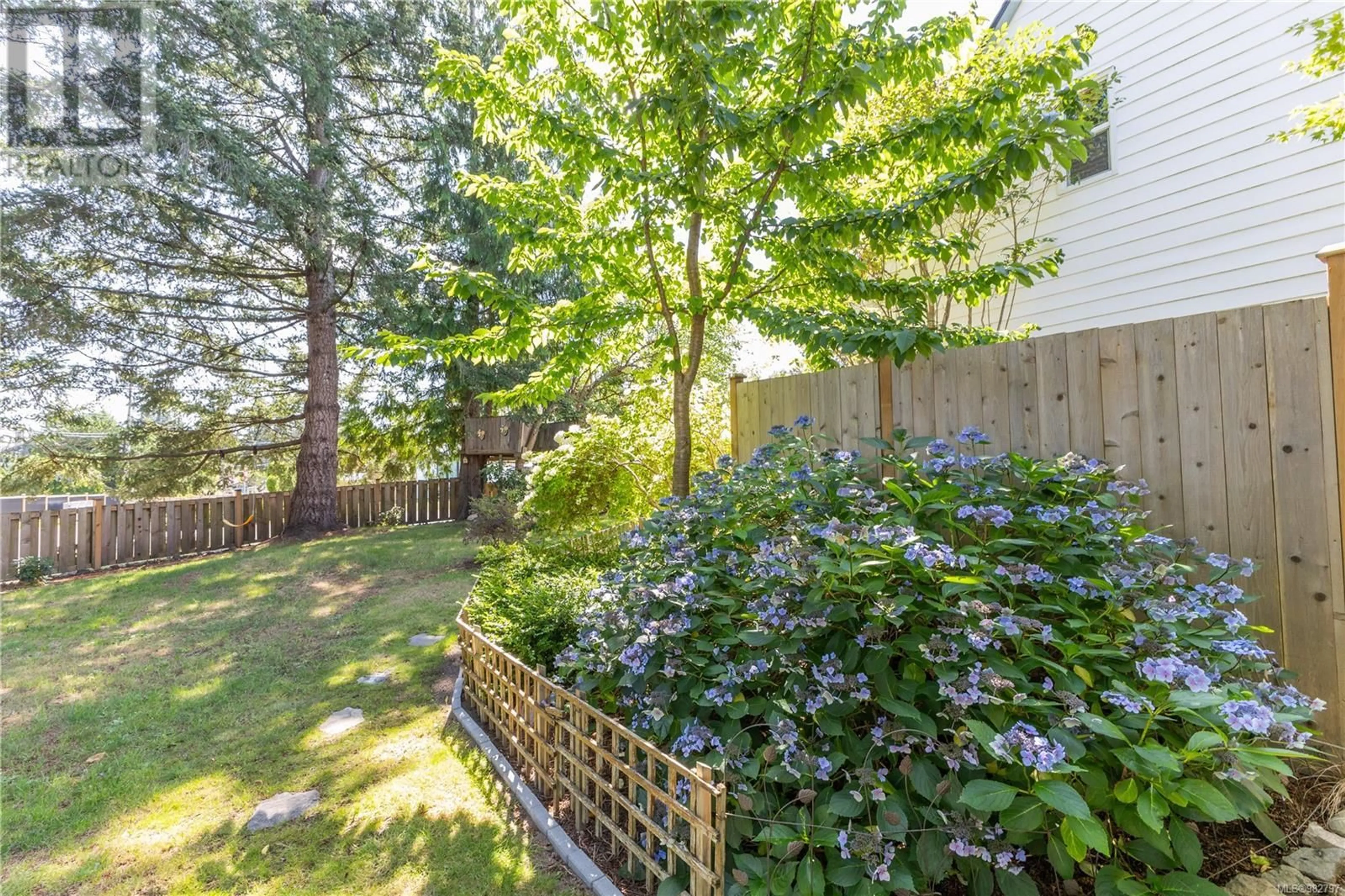 Patio, the fenced backyard for 614 Springbok Rd, Campbell River British Columbia V9W7C2