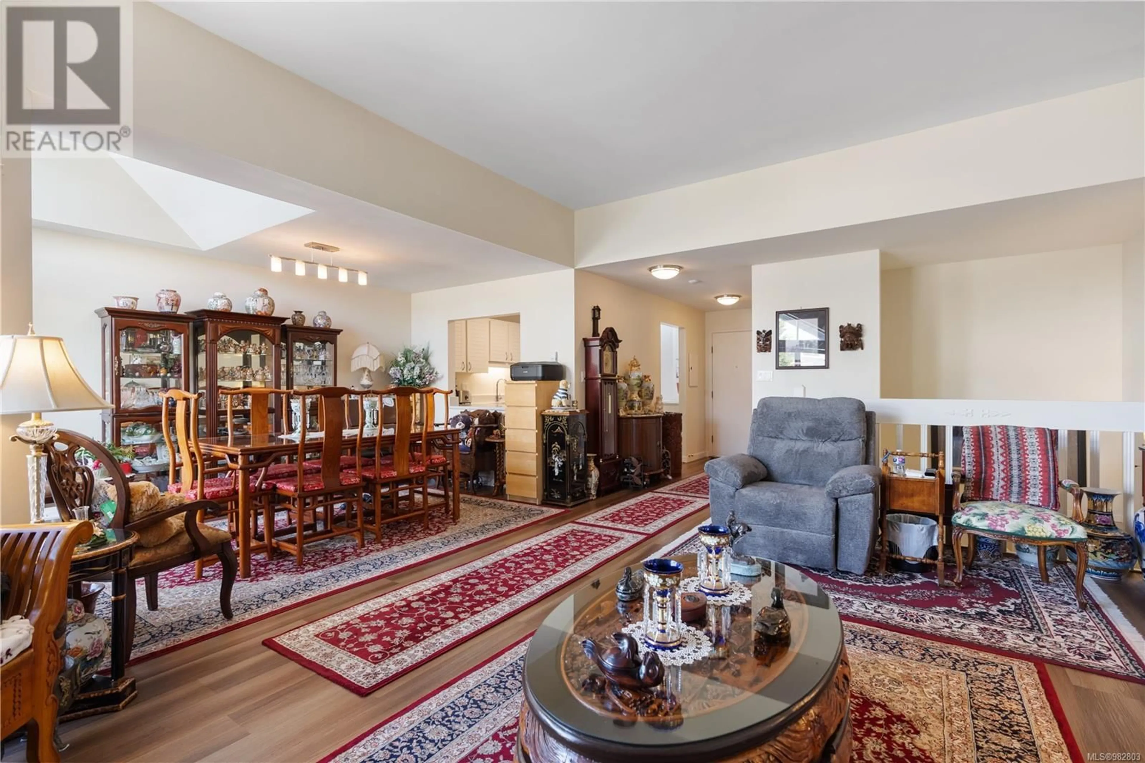 Living room, wood floors for 310 10459 Resthaven Dr, Sidney British Columbia V8L3H6