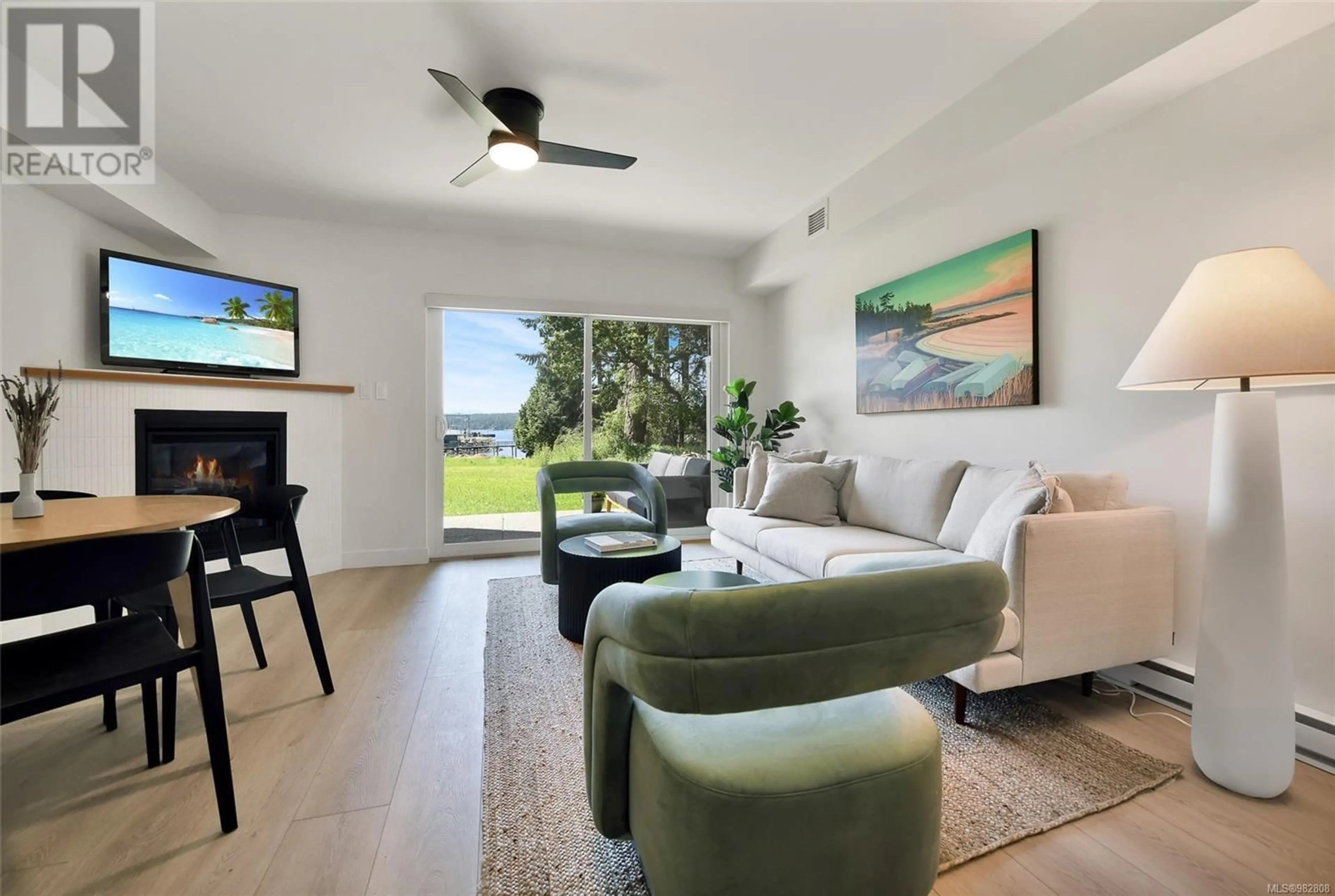 Living room, wood floors for 215 4305 Shingle Spit Rd, Hornby Island British Columbia V0R1Z0