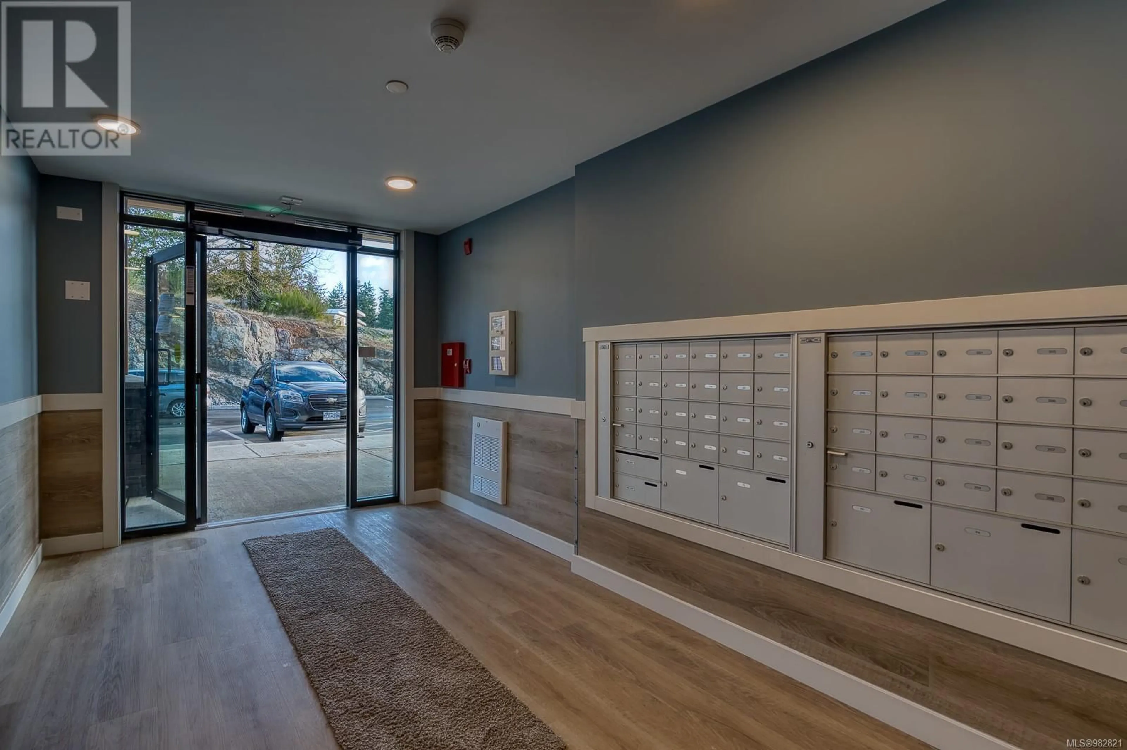 Indoor foyer, wood floors for 204 4810 Cedar Ridge Pl, Nanaimo British Columbia V9T0M7