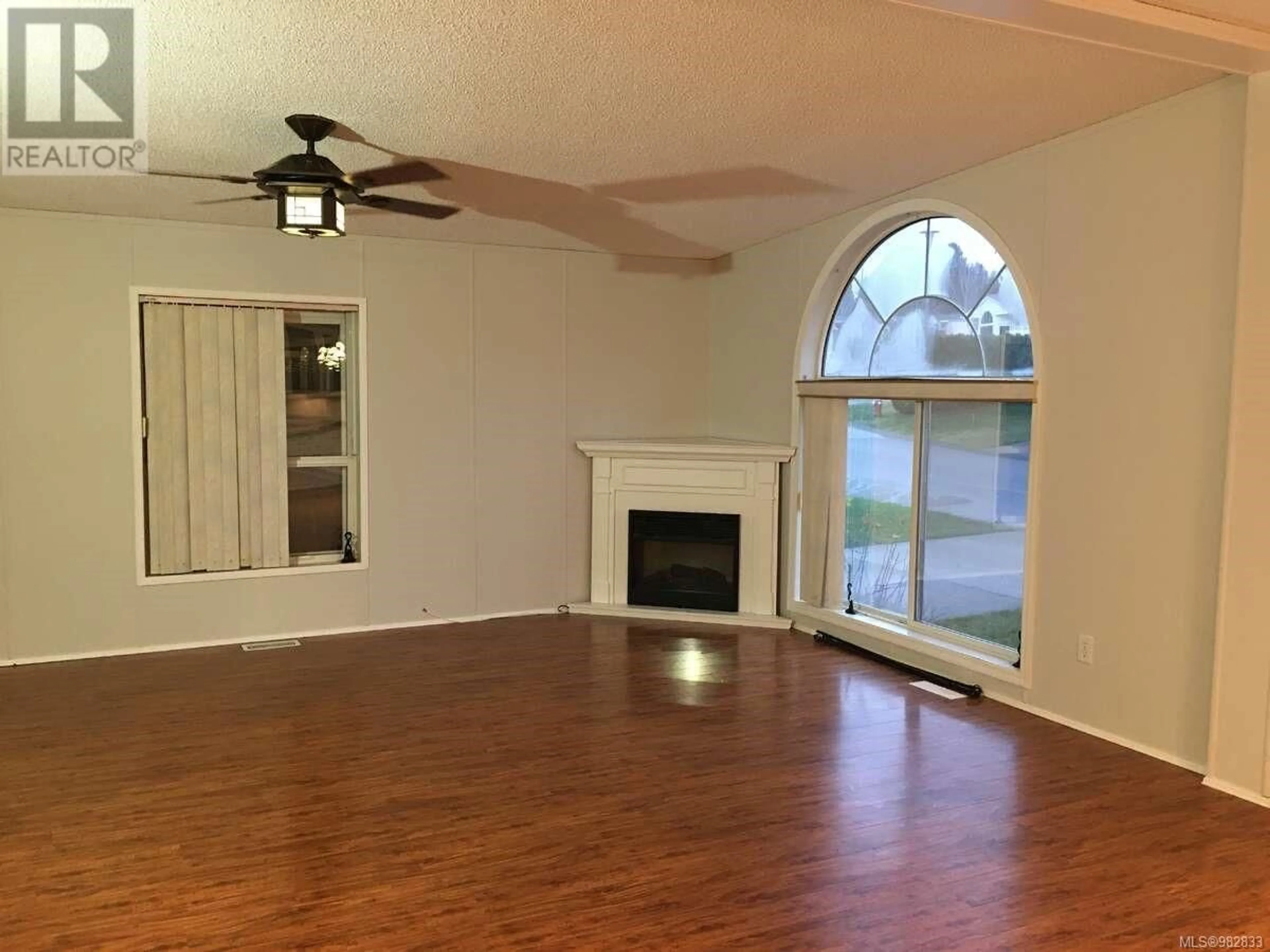 A pic of a room, wood floors for 5 4714 Muir Rd, Courtenay British Columbia V9N8Z6