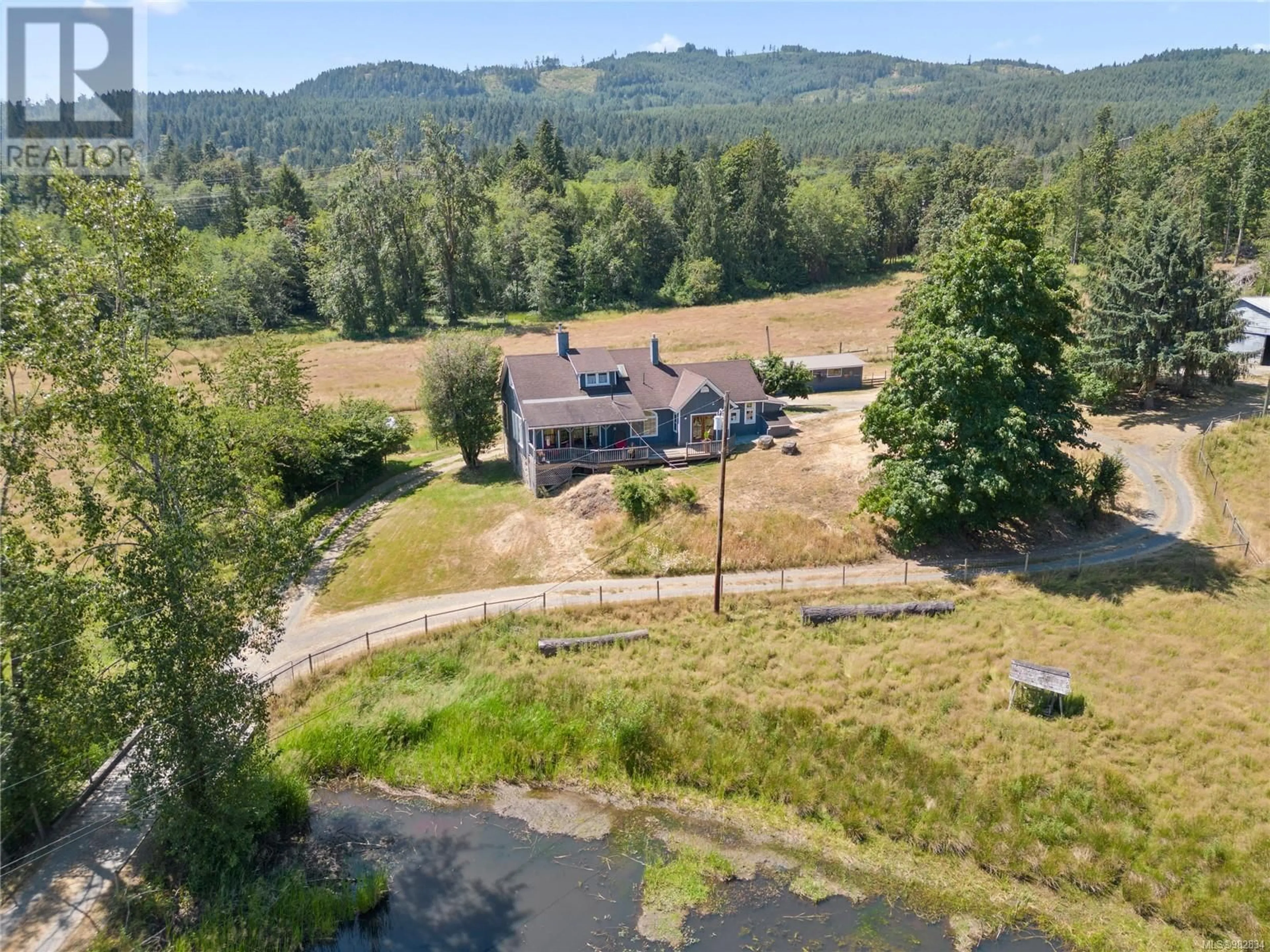 A pic from outside/outdoor area/front of a property/back of a property/a pic from drone, mountain view for 4330 HOWIE ROAD, Duncan British Columbia V9L6N3