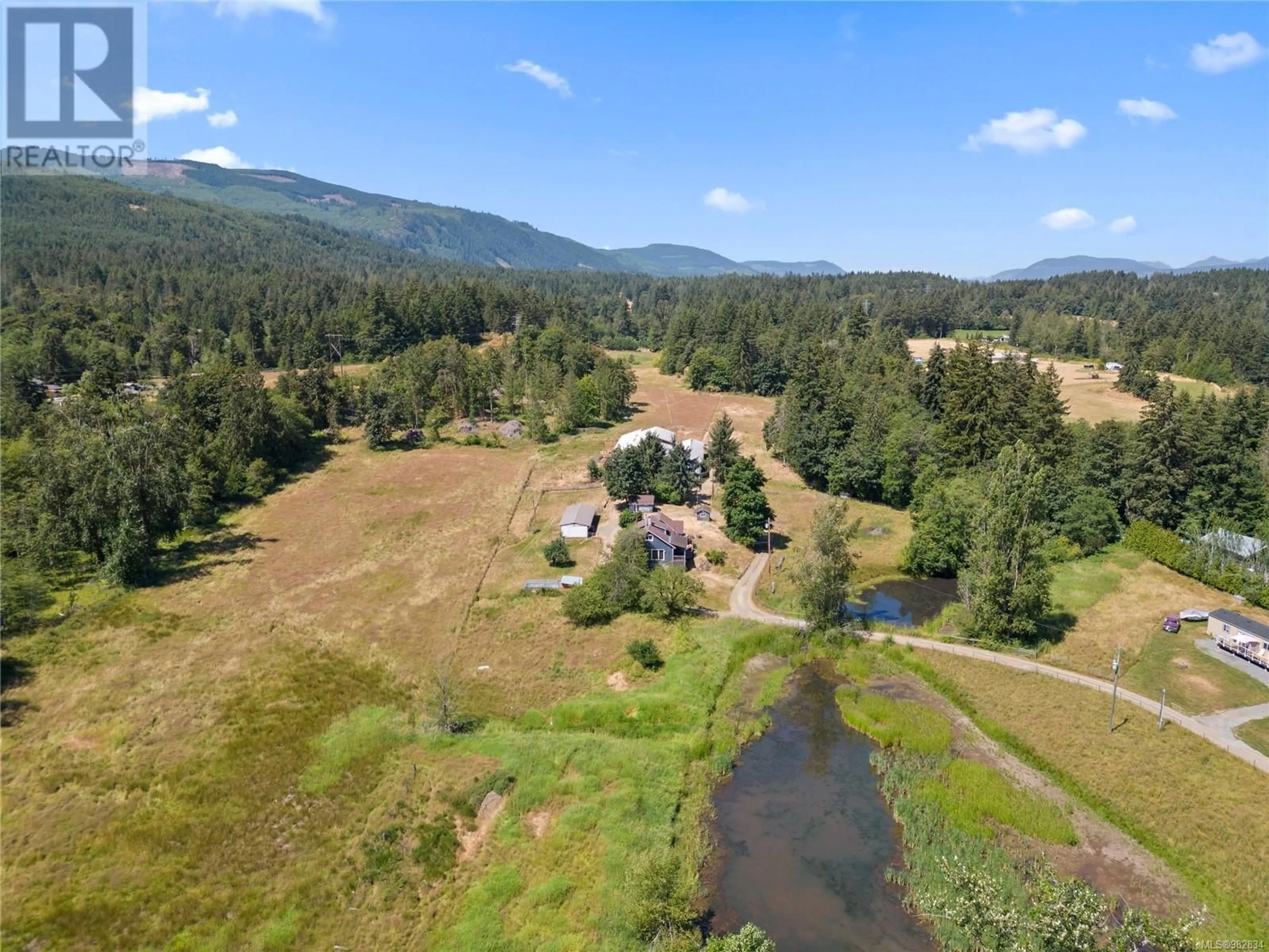A pic from outside/outdoor area/front of a property/back of a property/a pic from drone, water/lake/river/ocean view for 4330 HOWIE ROAD, Duncan British Columbia V9L6N3