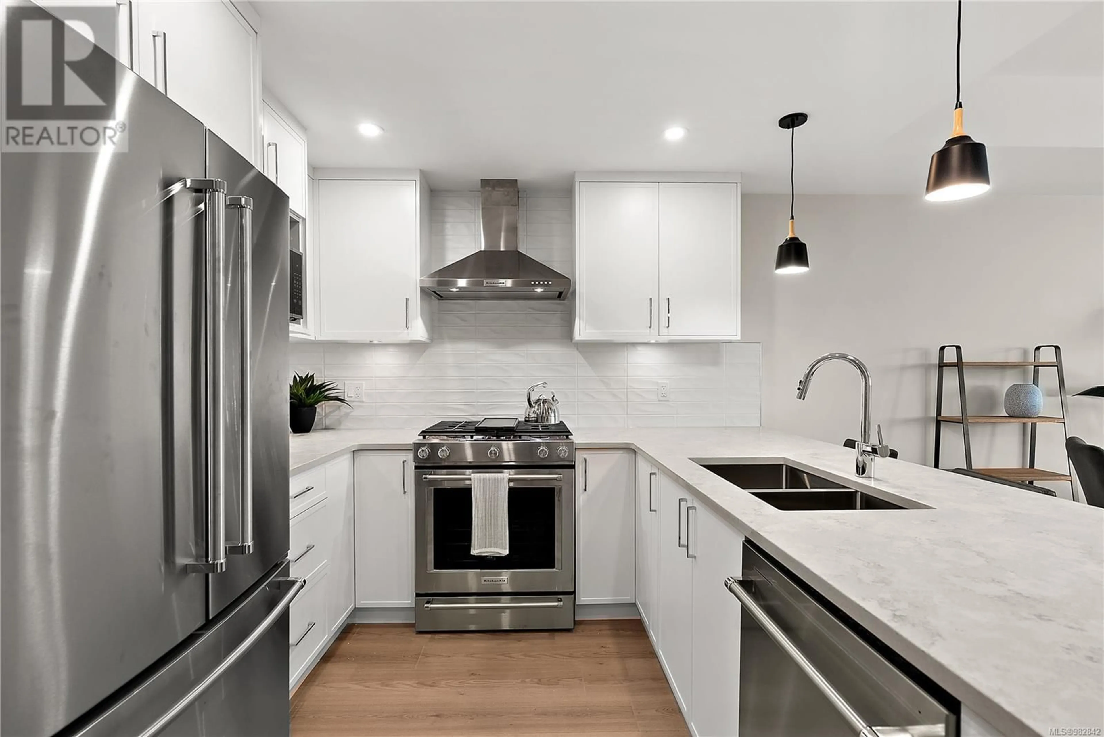 Contemporary kitchen, ceramic/tile floor for 201 2520 Hackett Cres, Central Saanich British Columbia V8M0B9