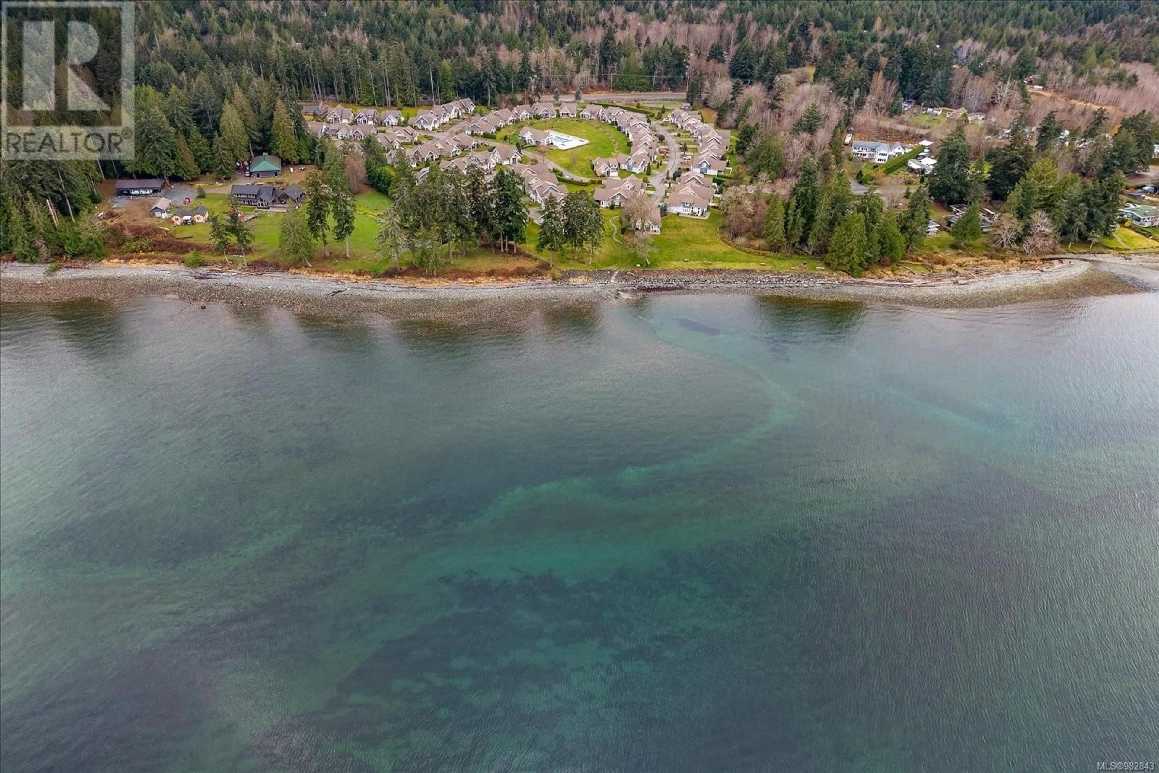 A pic from outside/outdoor area/front of a property/back of a property/a pic from drone, water/lake/river/ocean view for 50 5251 Island Hwy W, Qualicum Beach British Columbia V9K2C1