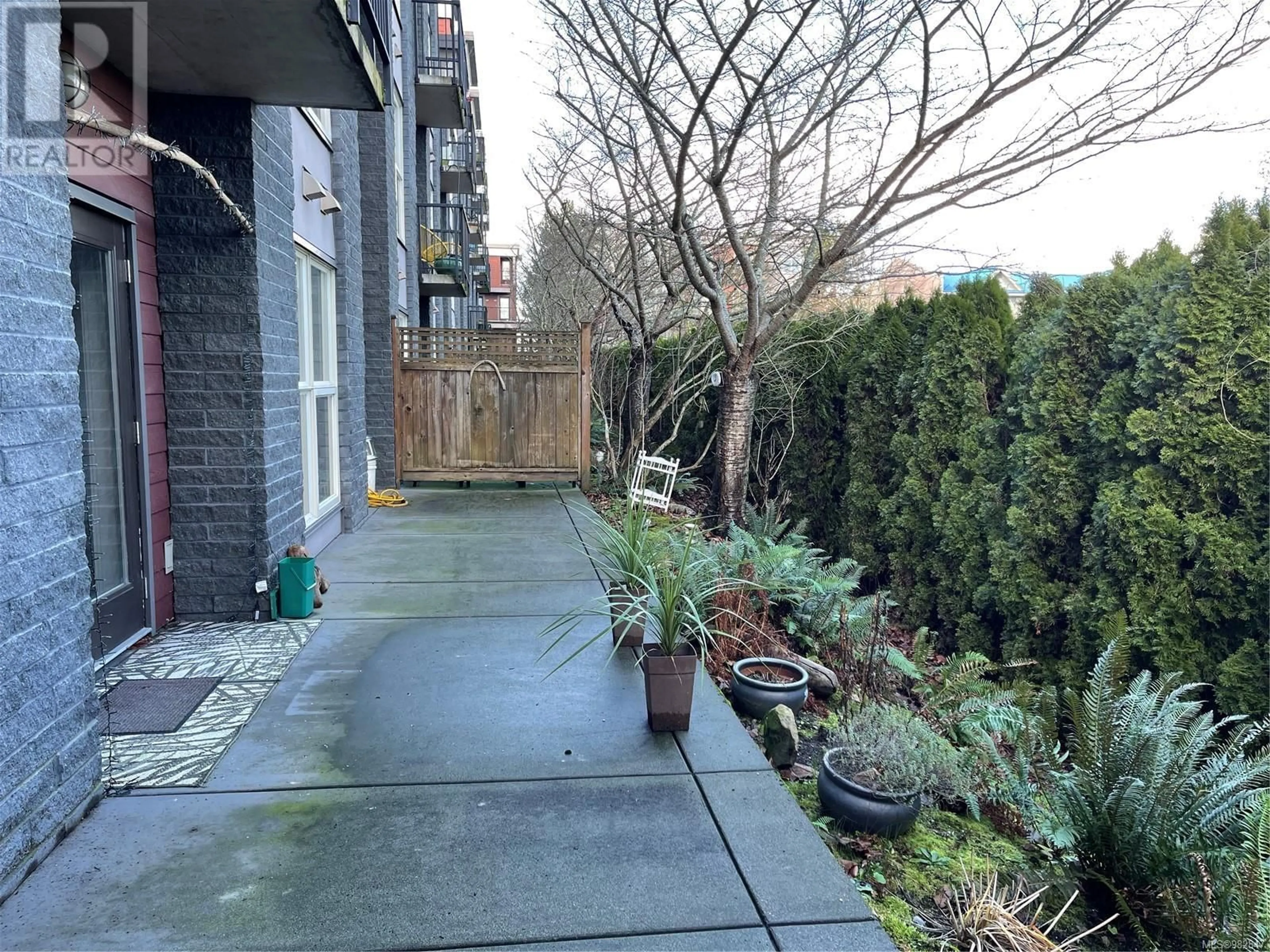 Patio, the fenced backyard for 105 555 Franklyn St, Nanaimo British Columbia V9R2X9