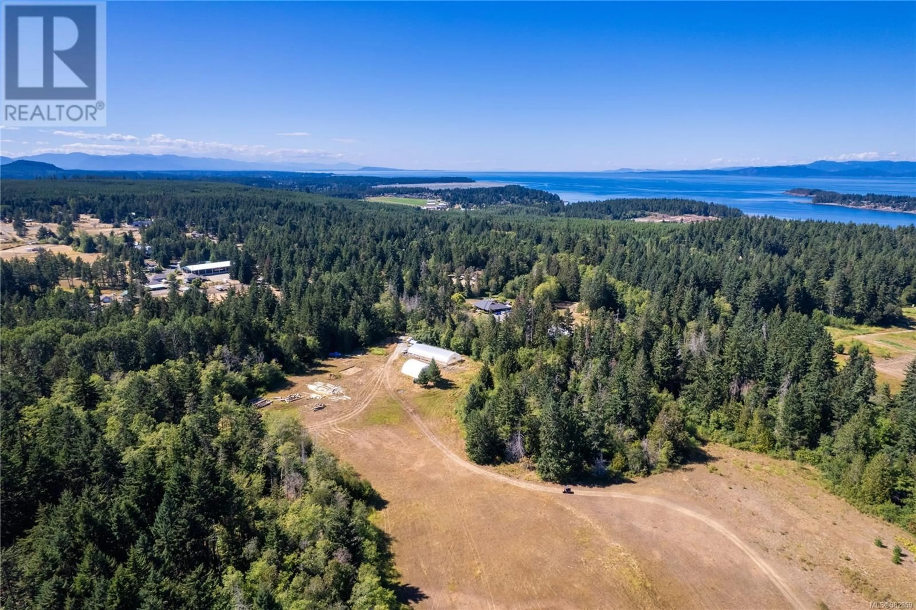 A pic from outside/outdoor area/front of a property/back of a property/a pic from drone, water/lake/river/ocean view for 2632 Northwest Bay Rd, Nanoose Bay British Columbia V9P9E7