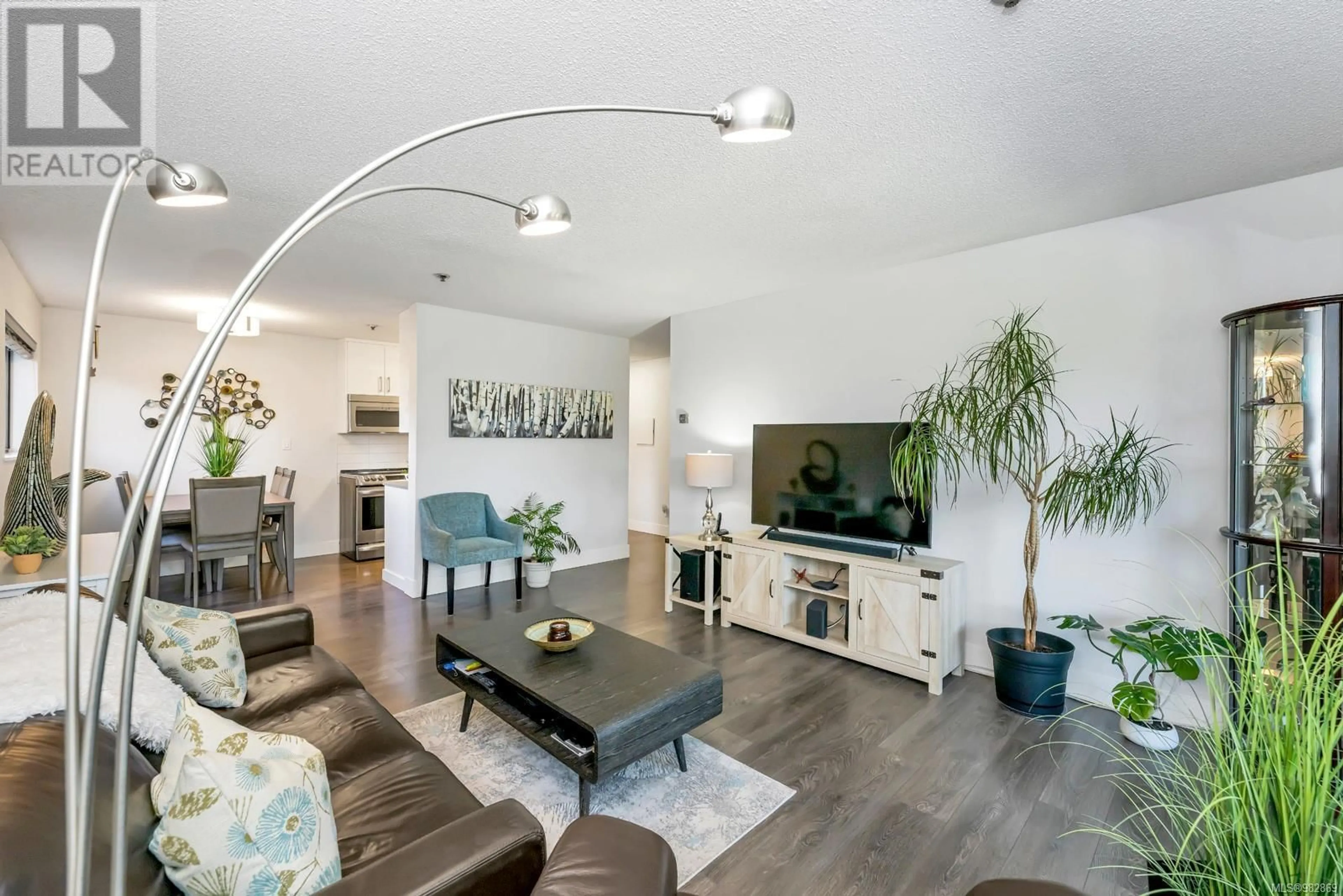 Living room, wood floors for 104 3277 Glasgow Ave, Saanich British Columbia V8X1M3