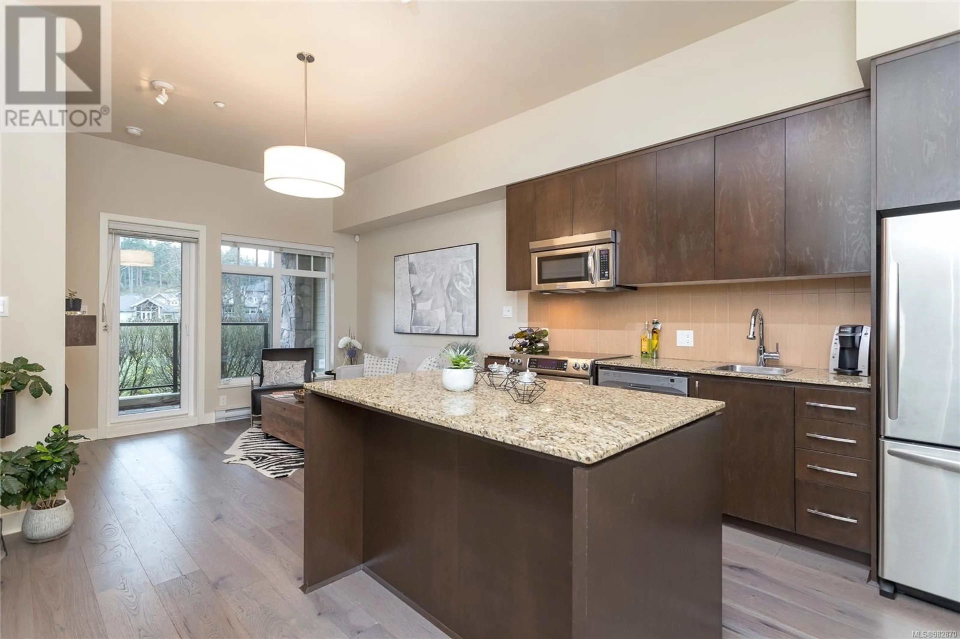 Open concept kitchen, unknown for 104 1395 Bear Mountain Pkwy, Langford British Columbia V9B0E1