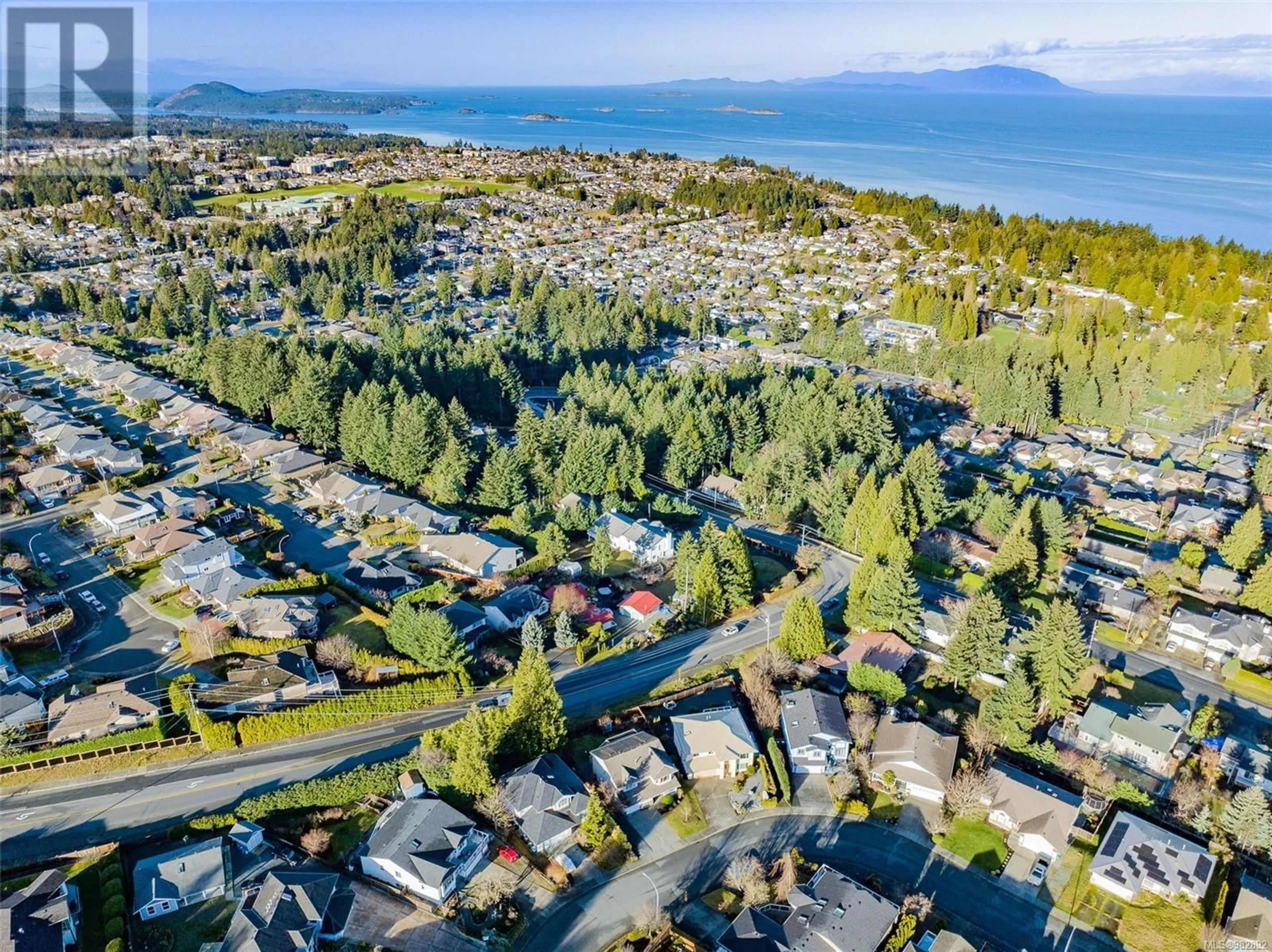 A pic from outside/outdoor area/front of a property/back of a property/a pic from drone, water/lake/river/ocean view for 5685 Malibu Terr, Nanaimo British Columbia V9T5W7