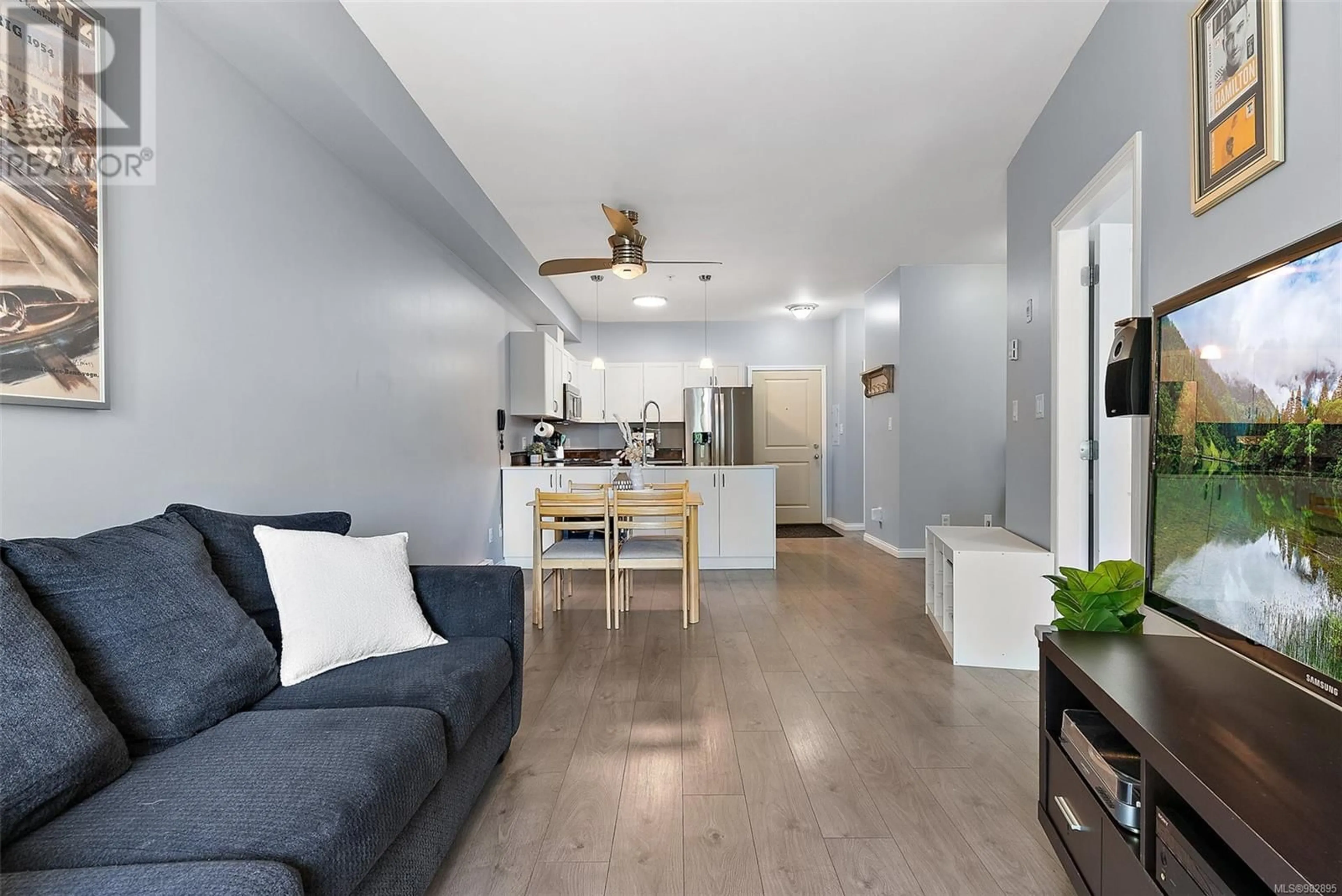 Living room with furniture, wood/laminate floor for 205 821 Goldstream Ave, Langford British Columbia V9B2X8