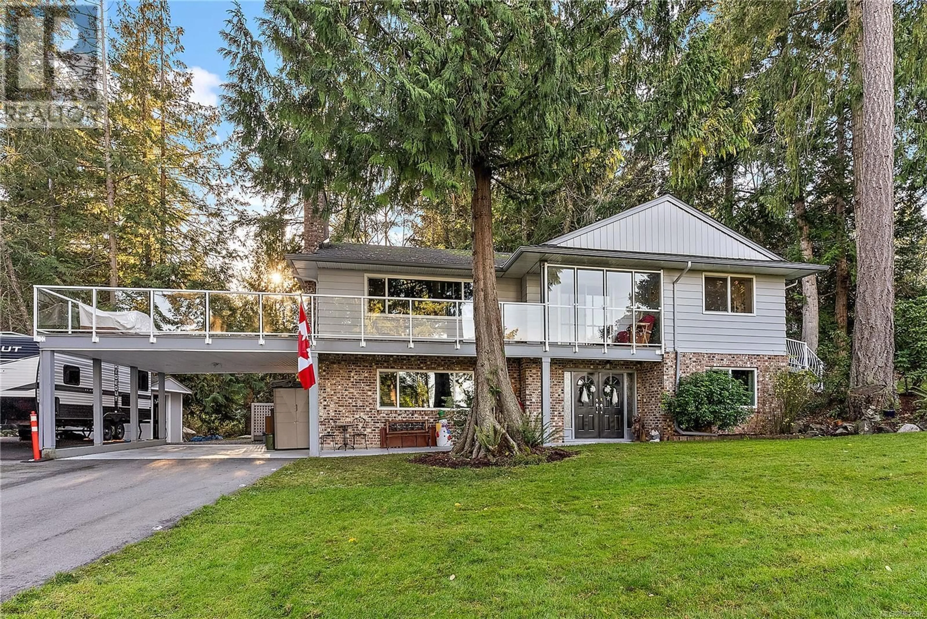 Home with vinyl exterior material, mountain view for 2040 Salem Terr, North Saanich British Columbia V8L5J4