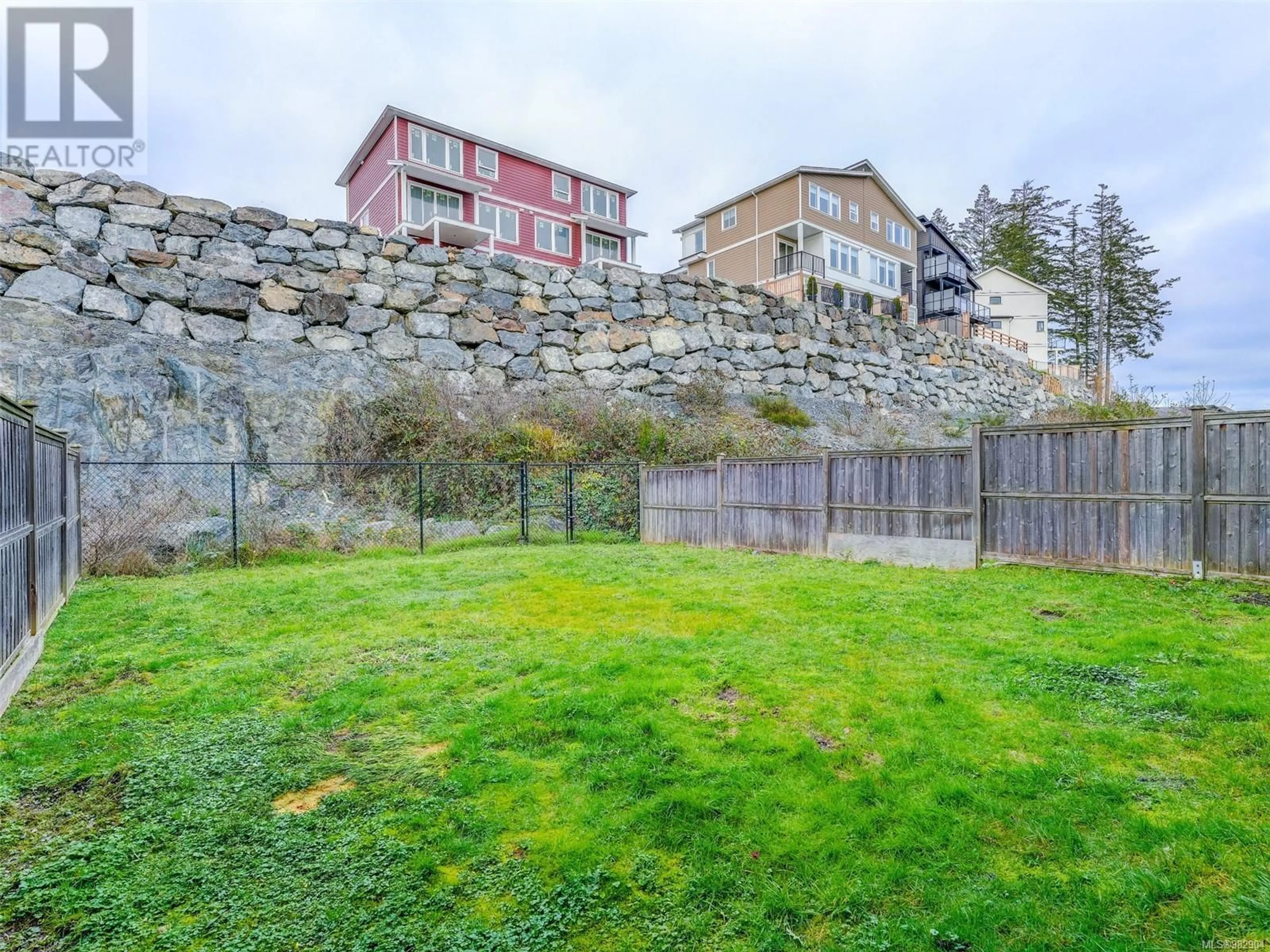 A pic from exterior of the house or condo, the fenced backyard for 7022 Brailsford Pl, Sooke British Columbia V9Z1J7