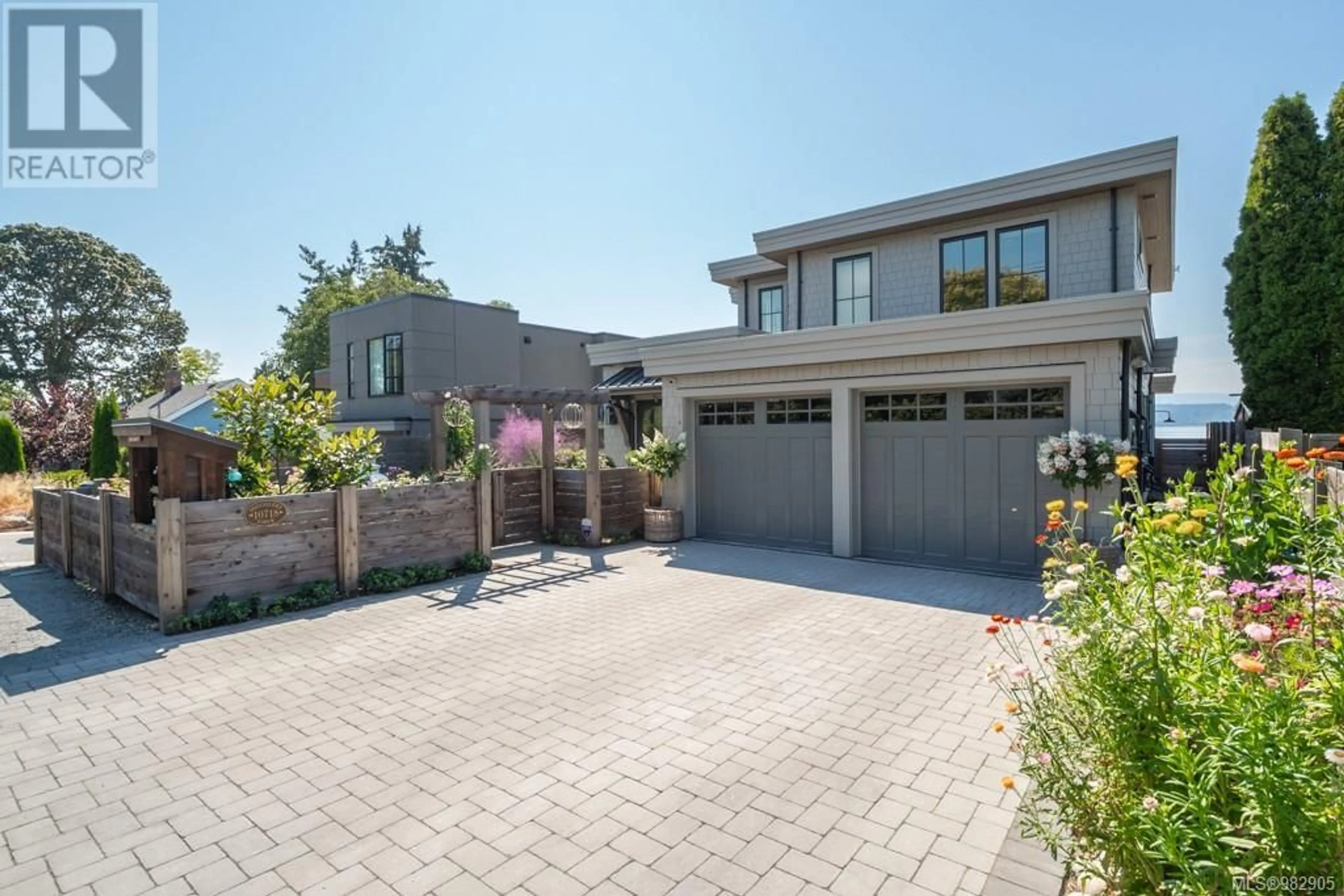 Home with brick exterior material, street for 10718 Madrona Dr, North Saanich British Columbia V8L5M7