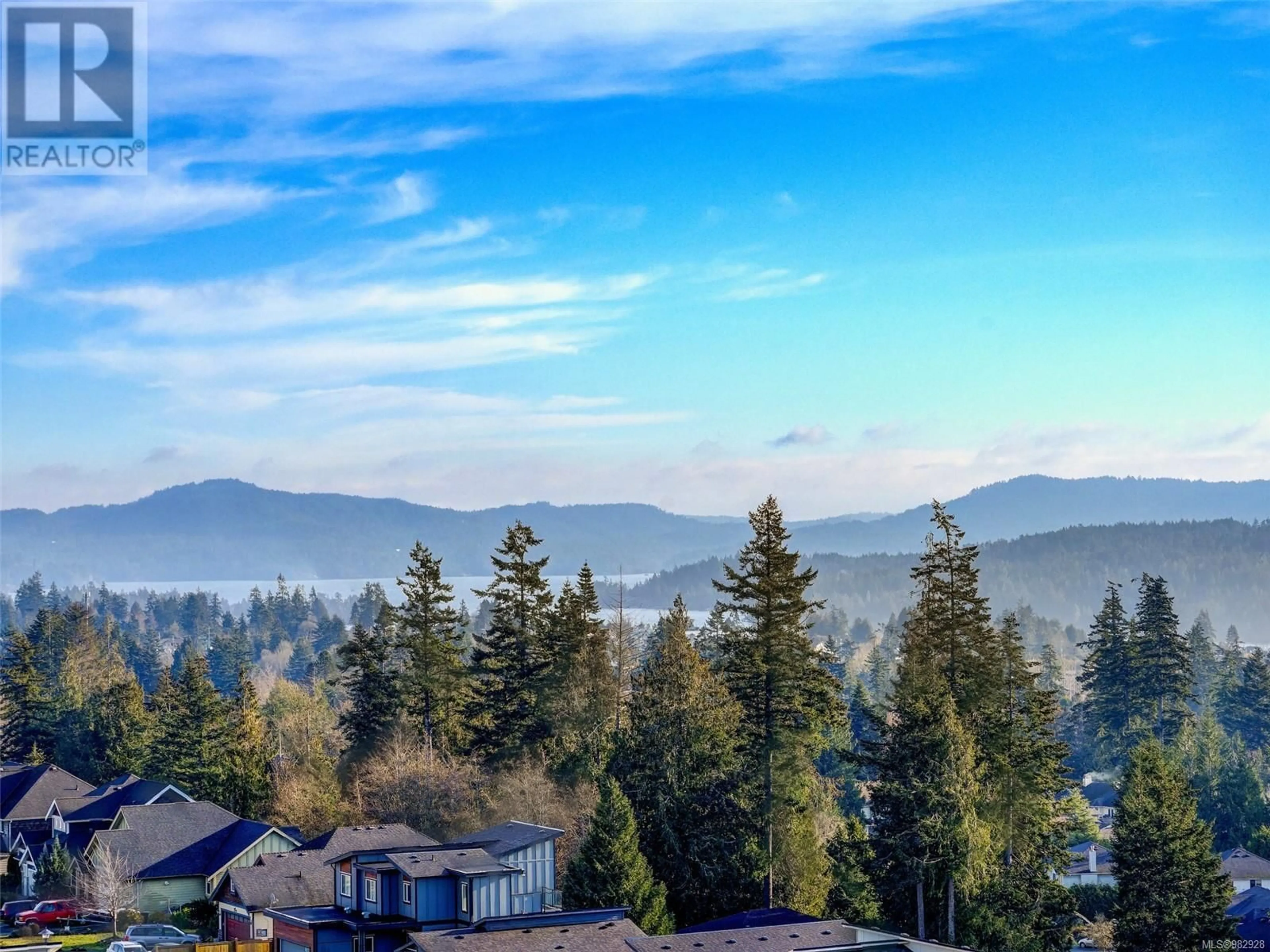 A pic from outside/outdoor area/front of a property/back of a property/a pic from drone, mountain view for 2287 Hudson Terr, Sooke British Columbia V9Z1R2