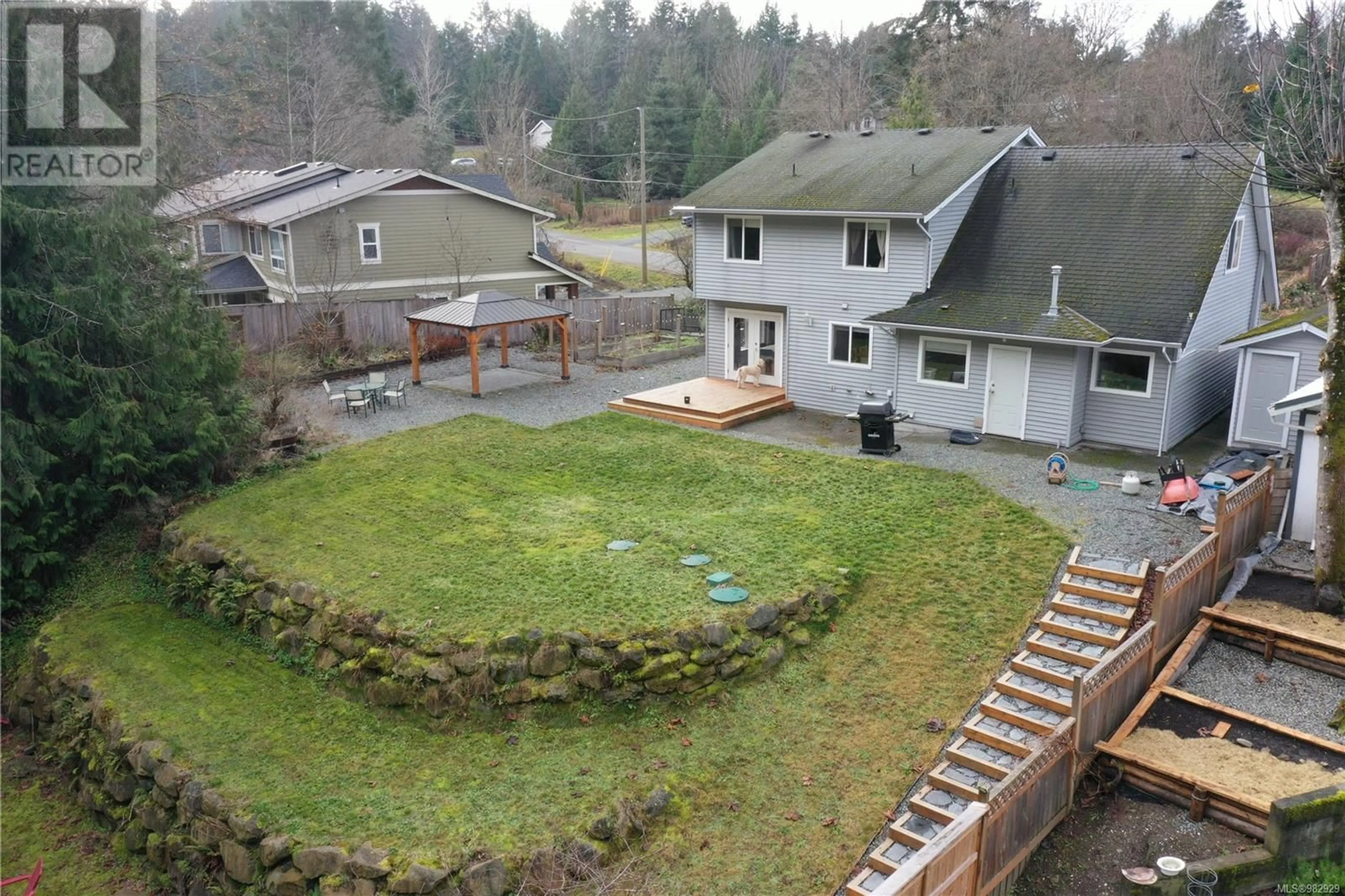 A pic from outside/outdoor area/front of a property/back of a property/a pic from drone, unknown for 1872 Kirkstone Way, Nanaimo British Columbia V9X1X1