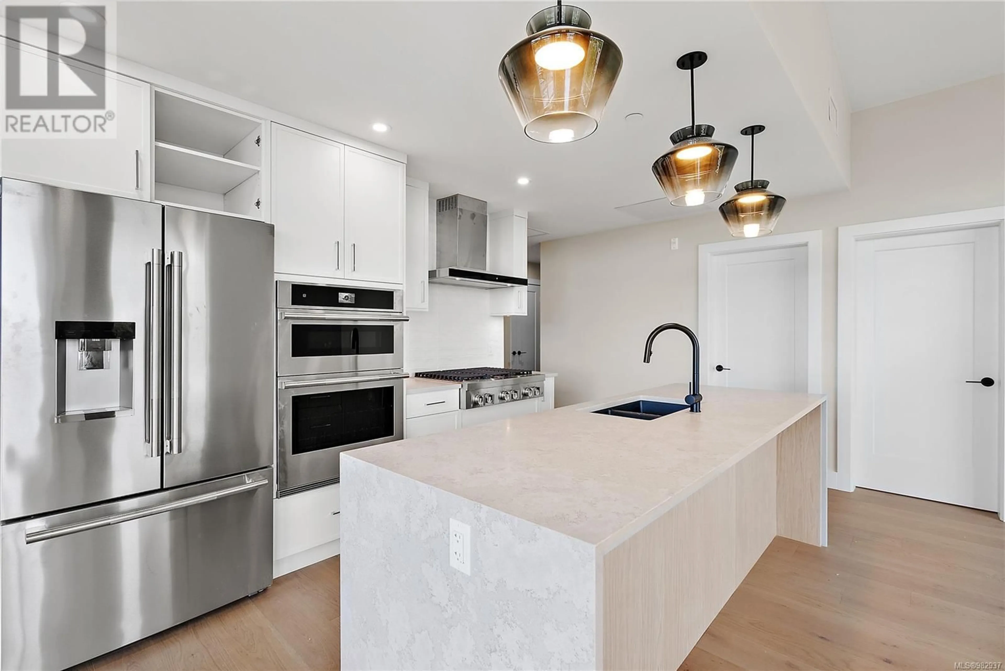 Contemporary kitchen, ceramic/tile floor for 203 2520 Hackett Cres, Central Saanich British Columbia V8M0B9