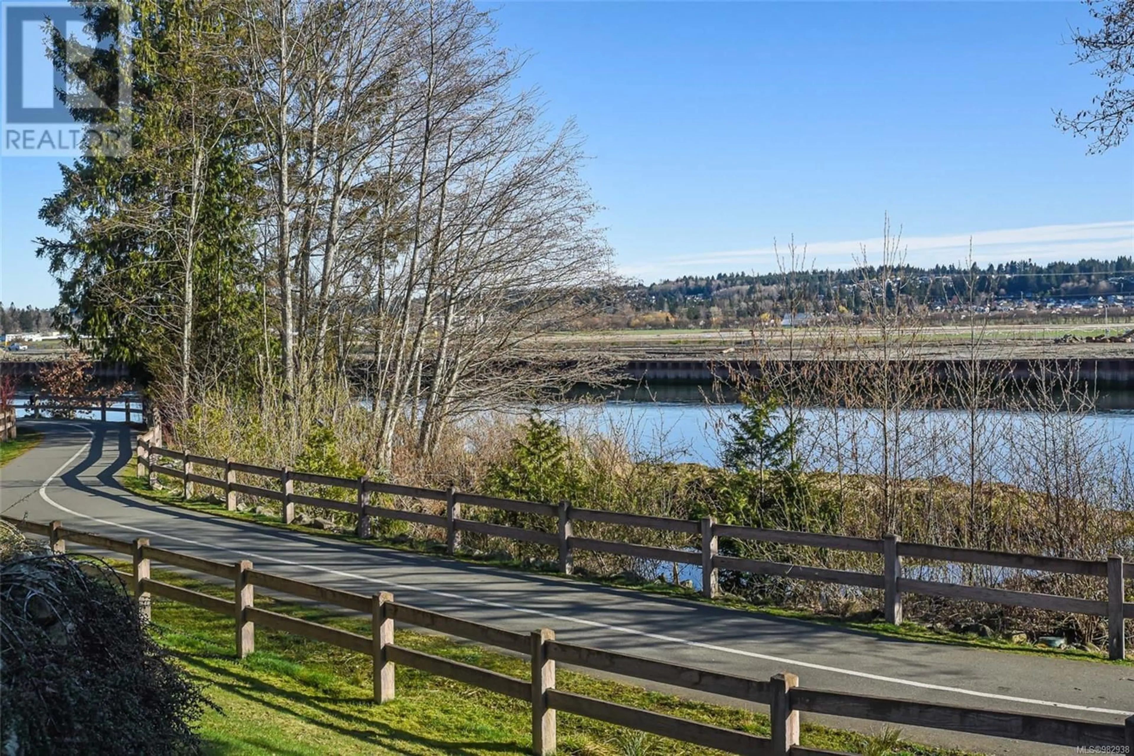 Patio, water/lake/river/ocean view for 108 1944 Riverside Lane, Courtenay British Columbia V9N0E5