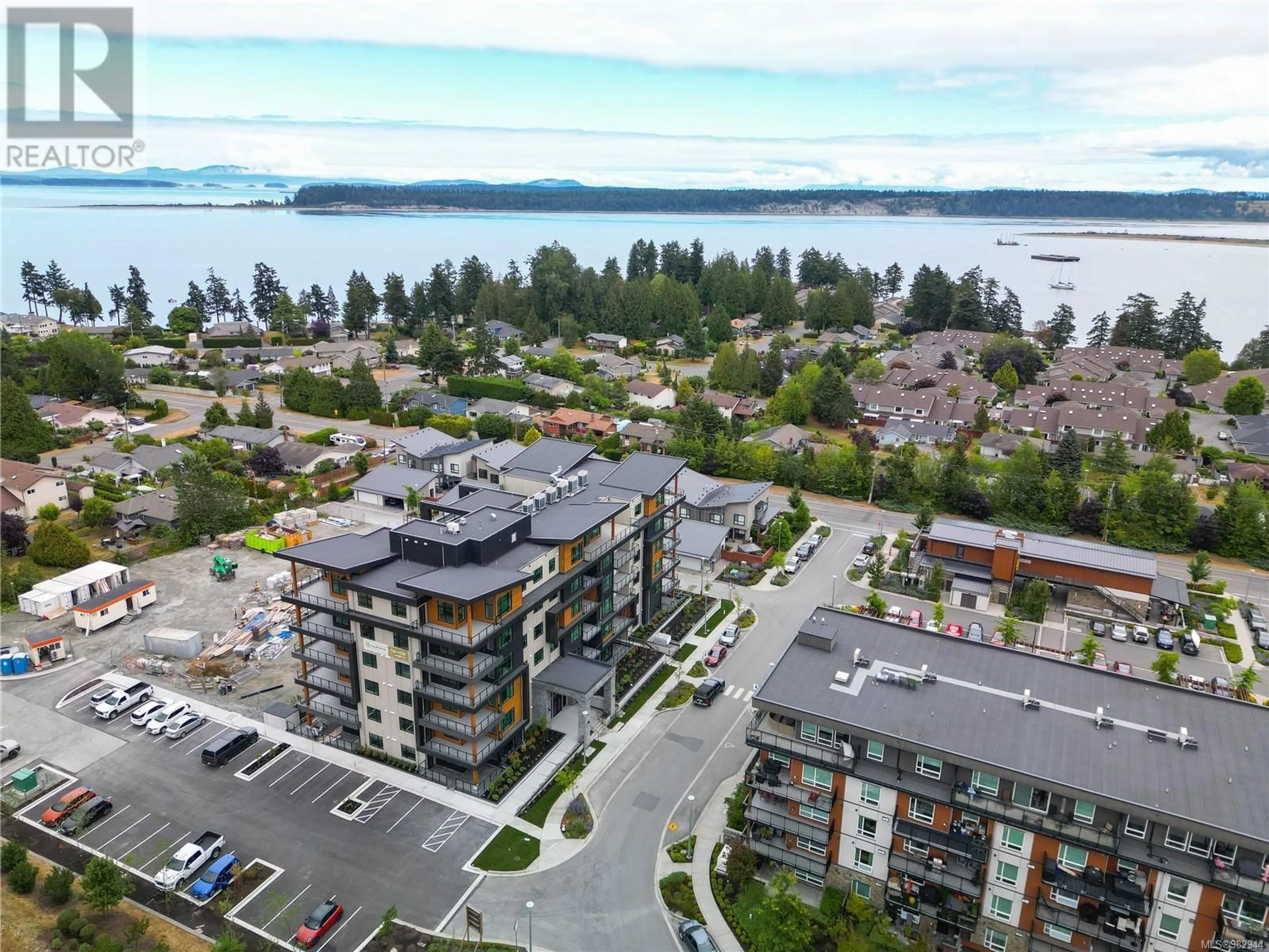 A pic from outside/outdoor area/front of a property/back of a property/a pic from drone, water/lake/river/ocean view for 404 2520 Hackett Cres, Central Saanich British Columbia V8M0B9