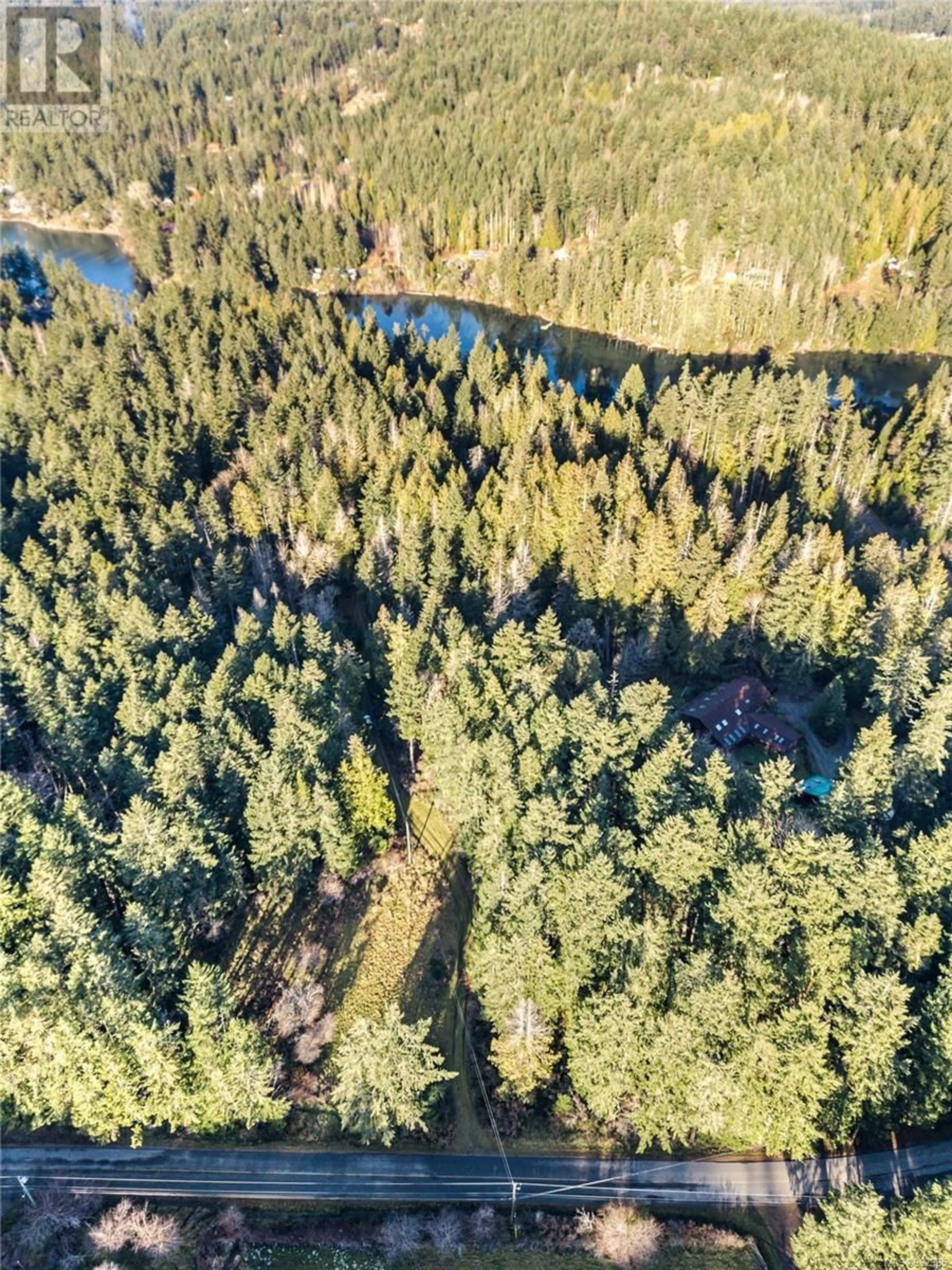 A pic from outside/outdoor area/front of a property/back of a property/a pic from drone, forest/trees view for 808 RAINBOW ROAD, Salt Spring British Columbia V8K2M8