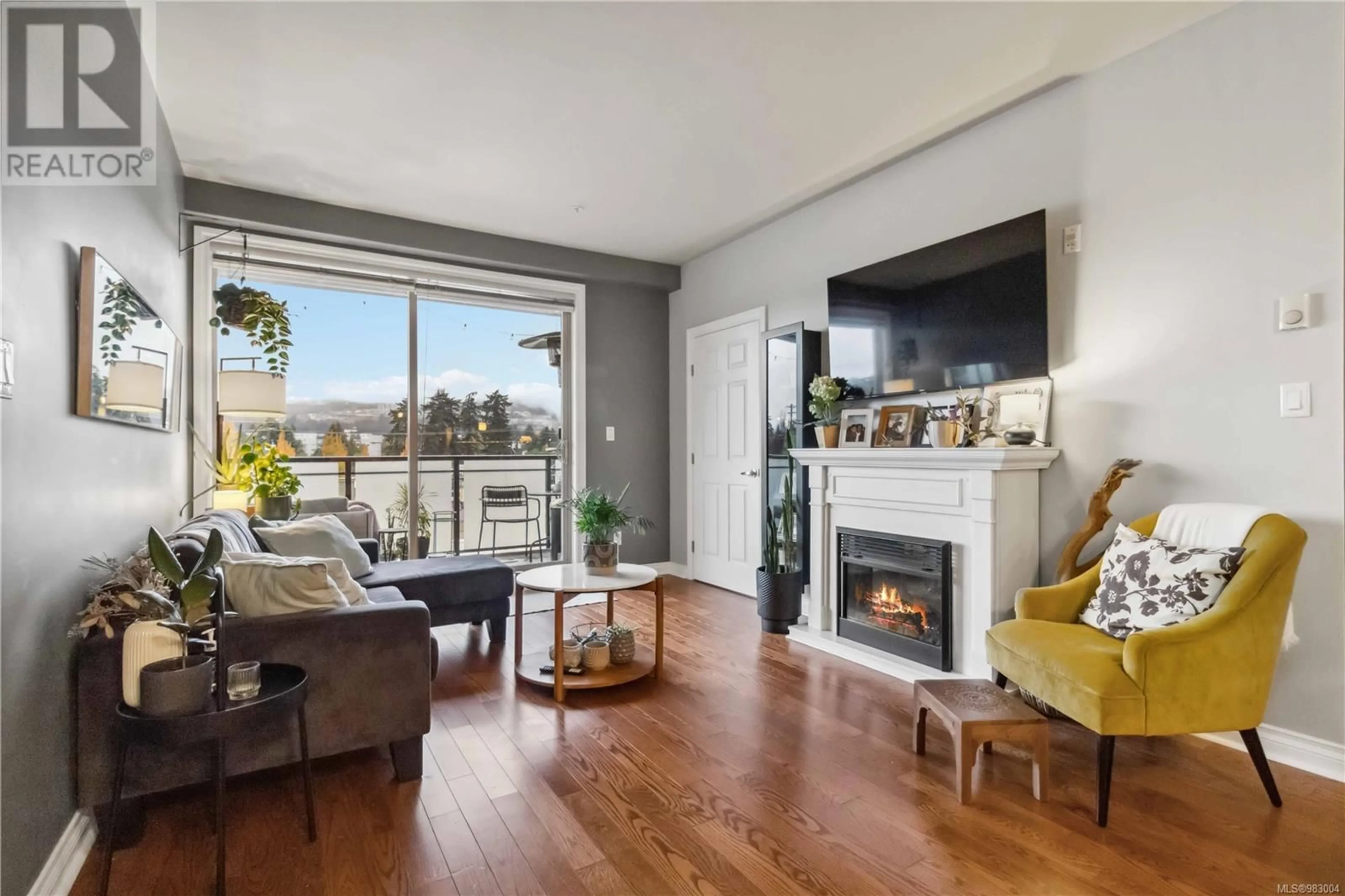 Living room with furniture, wood/laminate floor for 306 866 Goldstream Ave, Langford British Columbia V9B2X9