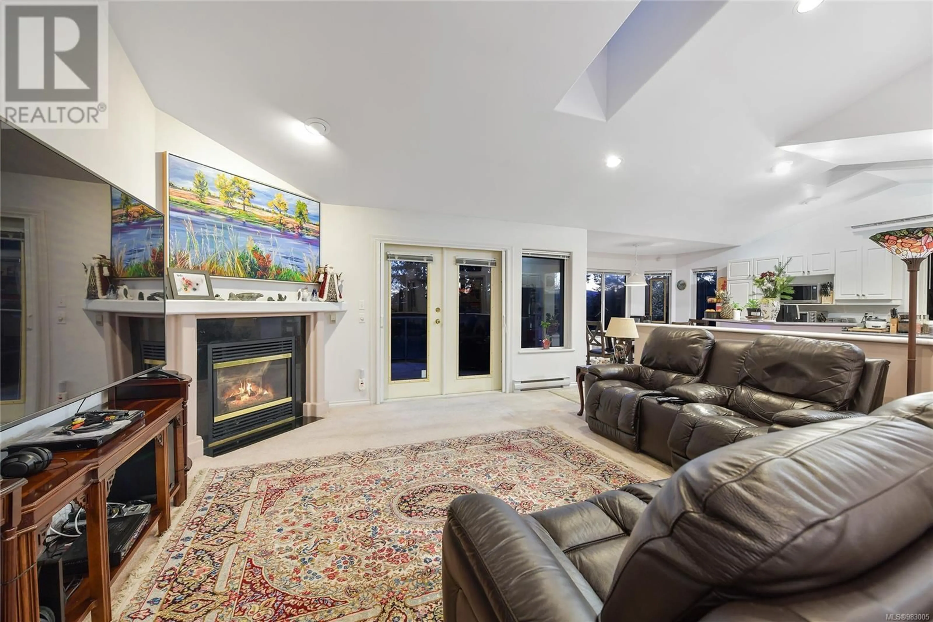 Living room with furniture, ceramic/tile floor for 613 Downey Rd, North Saanich British Columbia V8L5M6