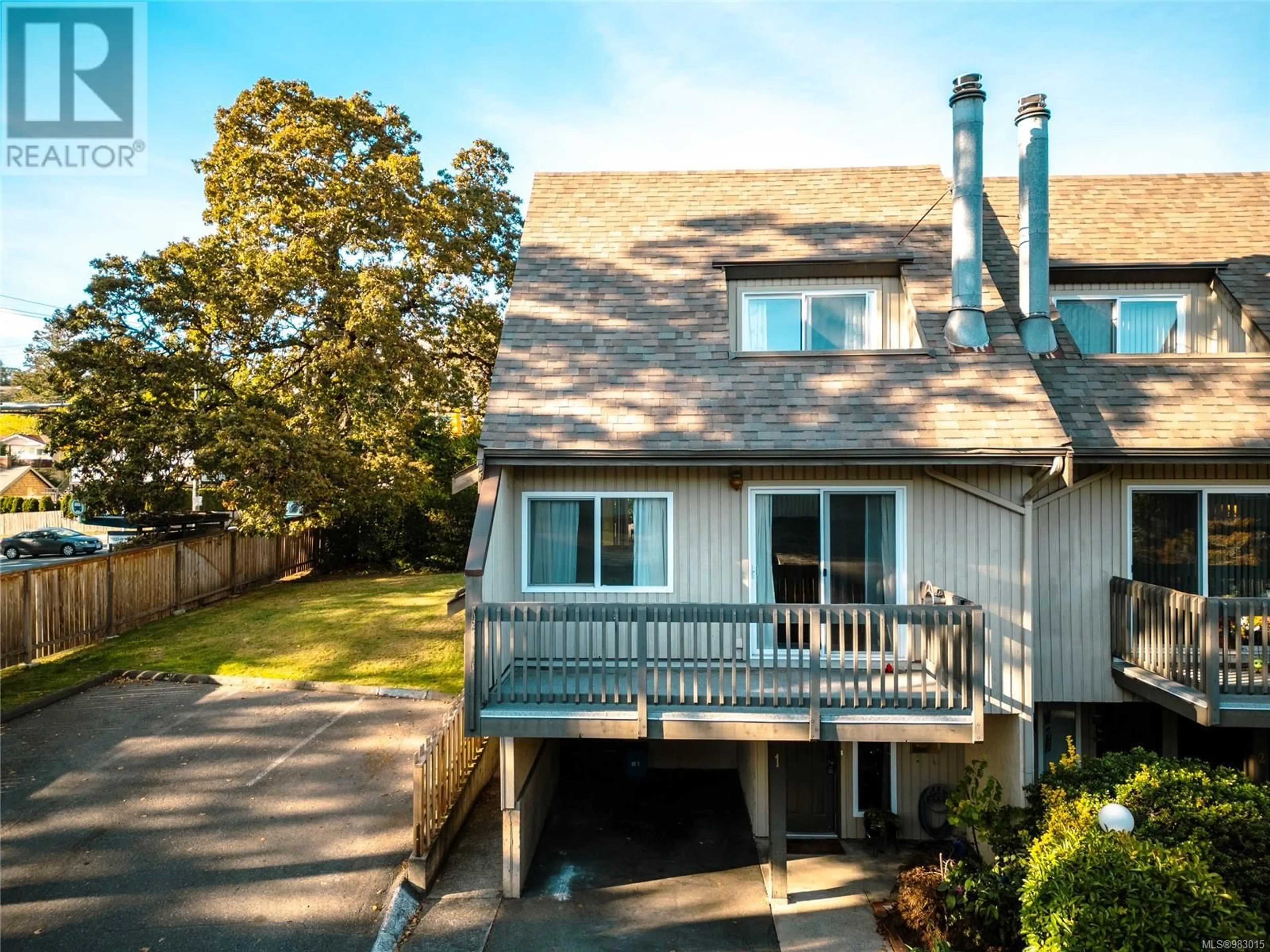 Home with vinyl exterior material, water/lake/river/ocean view for 1 3981 Saanich Rd, Saanich British Columbia V8X1Y9