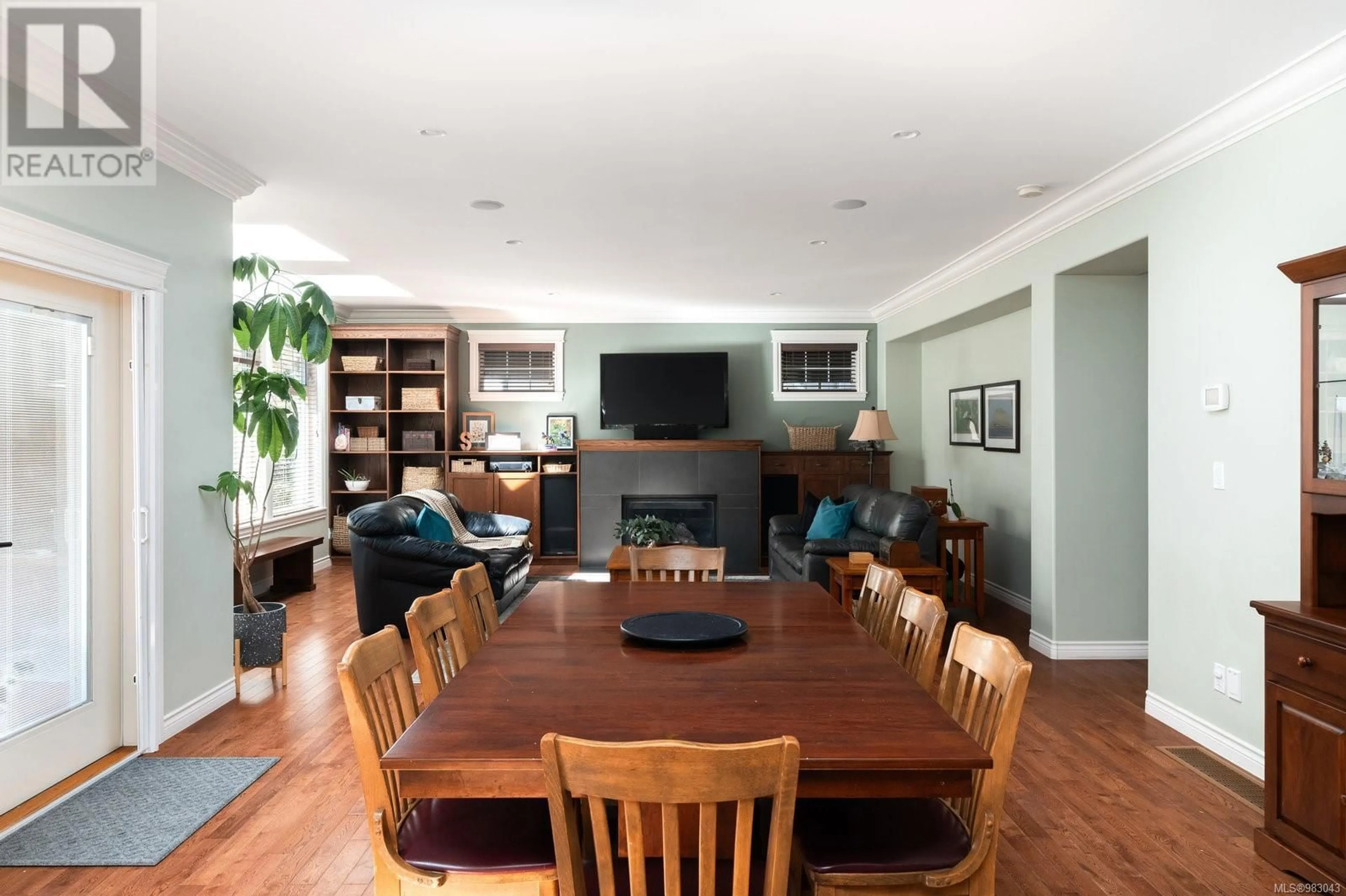 Living room with furniture, wood/laminate floor for 8550 Bourne Terr, North Saanich British Columbia V8L1L8