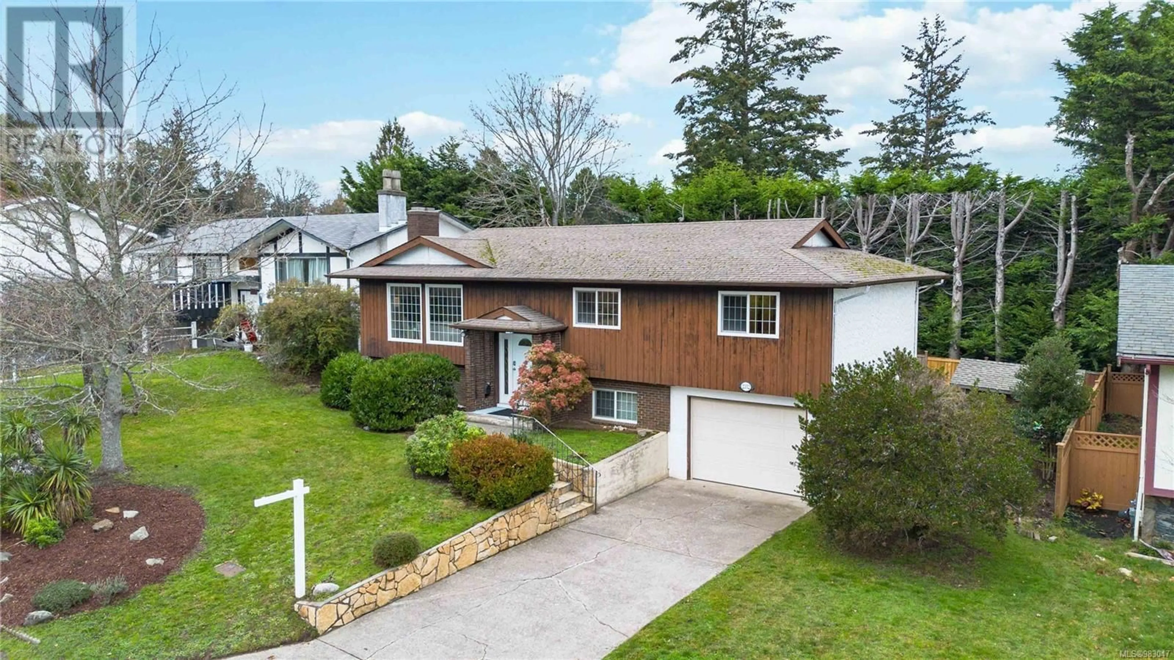 A pic from outside/outdoor area/front of a property/back of a property/a pic from drone, street for 2312 Hazelton Pl, Saanich British Columbia V8N5C3