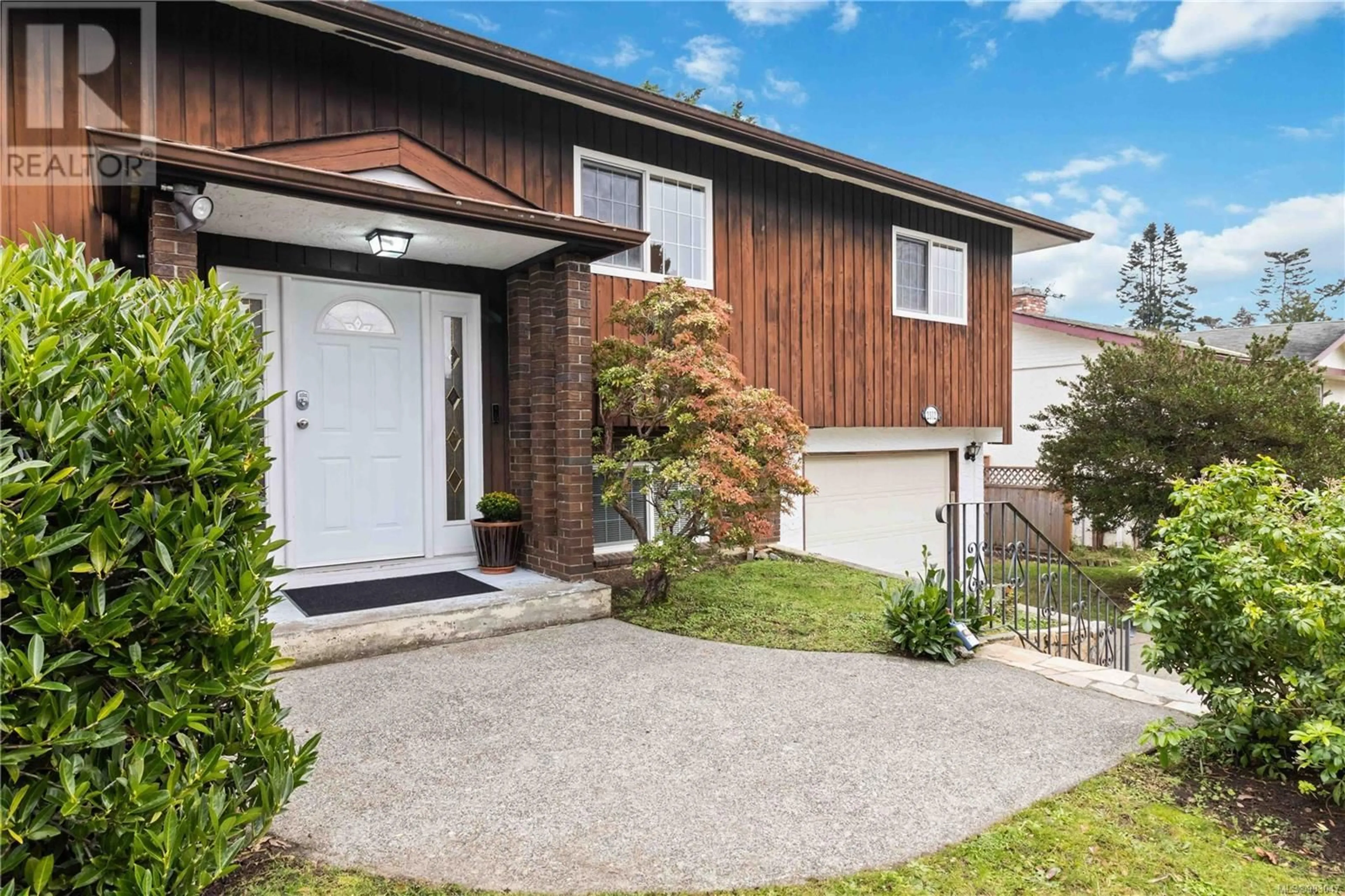 Home with brick exterior material, street for 2312 Hazelton Pl, Saanich British Columbia V8N5C3