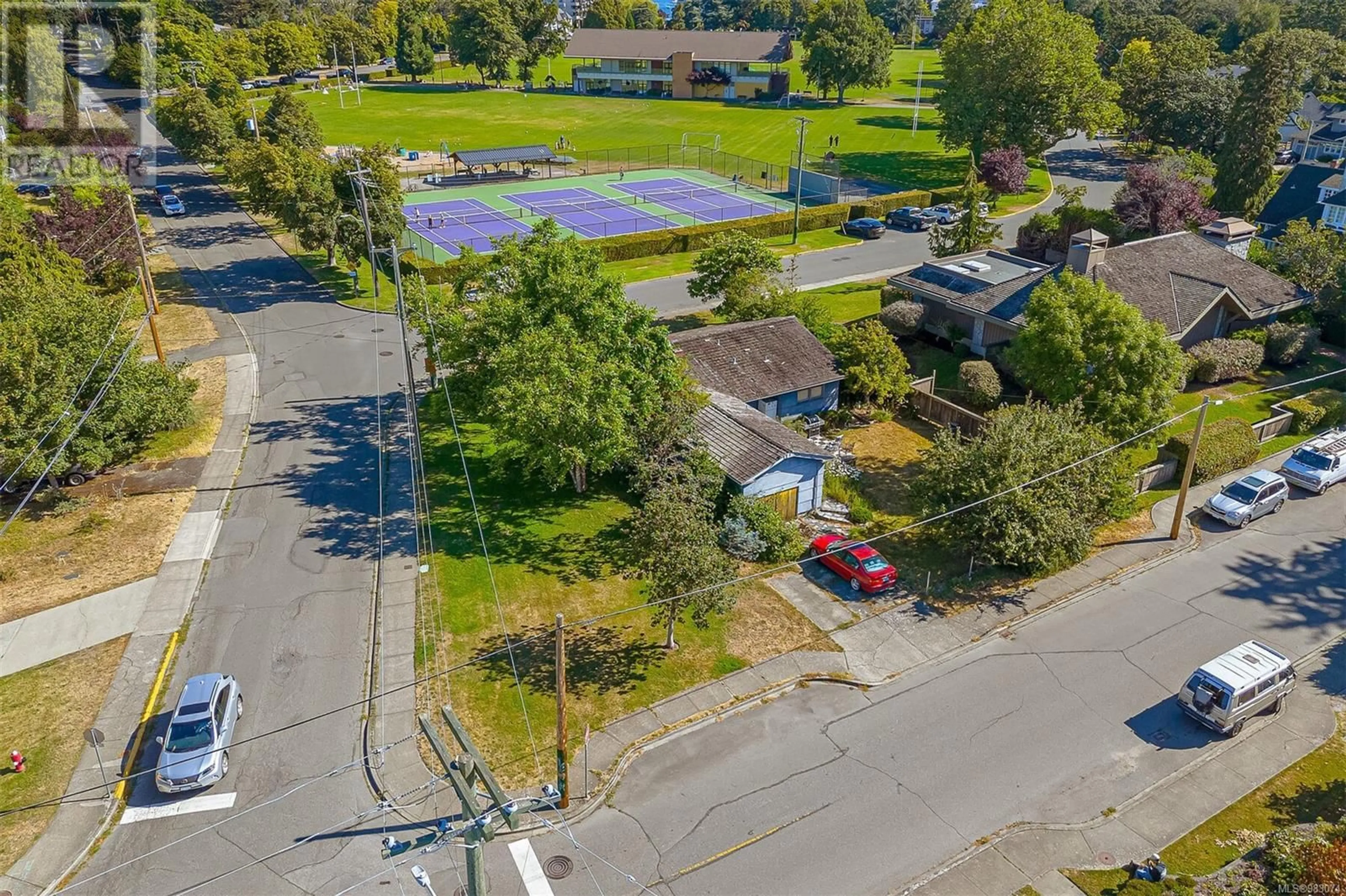 A pic from outside/outdoor area/front of a property/back of a property/a pic from drone, street for 2409 Currie Rd, Oak Bay British Columbia V8S3B5