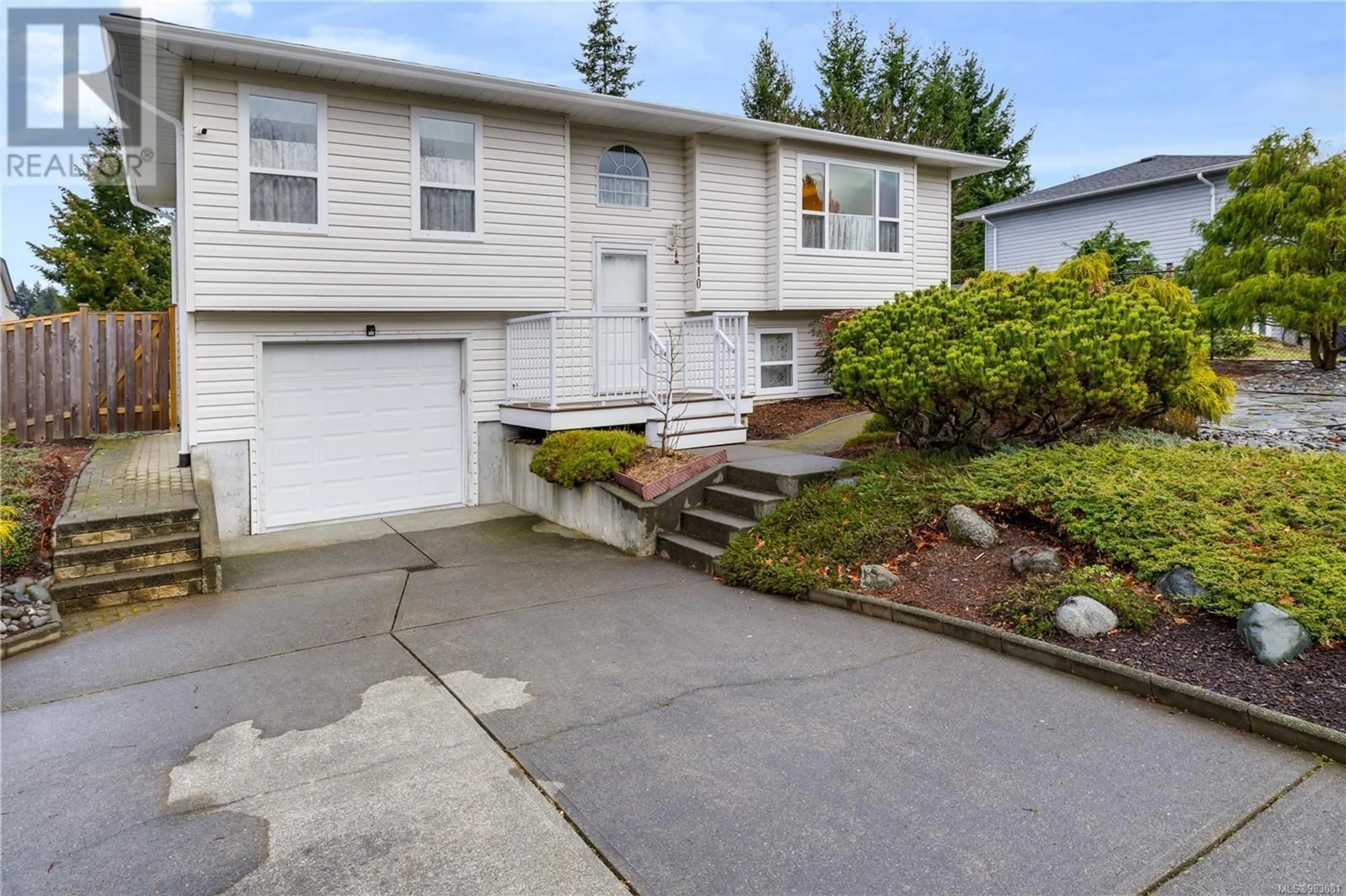 Home with vinyl exterior material, street for 1410 Canso Ave, Comox British Columbia V9M3C3