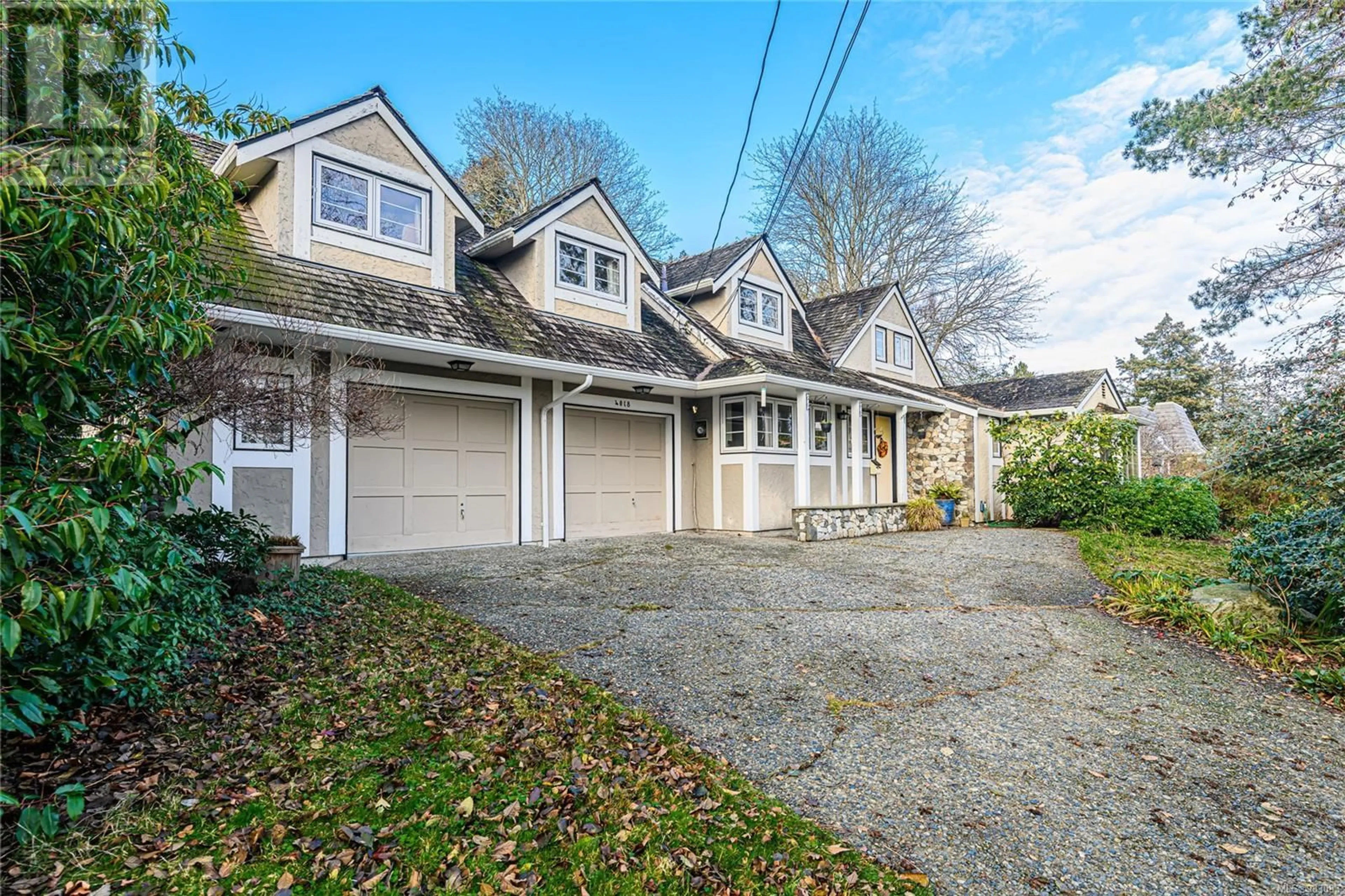 A pic from outside/outdoor area/front of a property/back of a property/a pic from drone, street for 4018 Locarno Lane, Saanich British Columbia V8N4A1