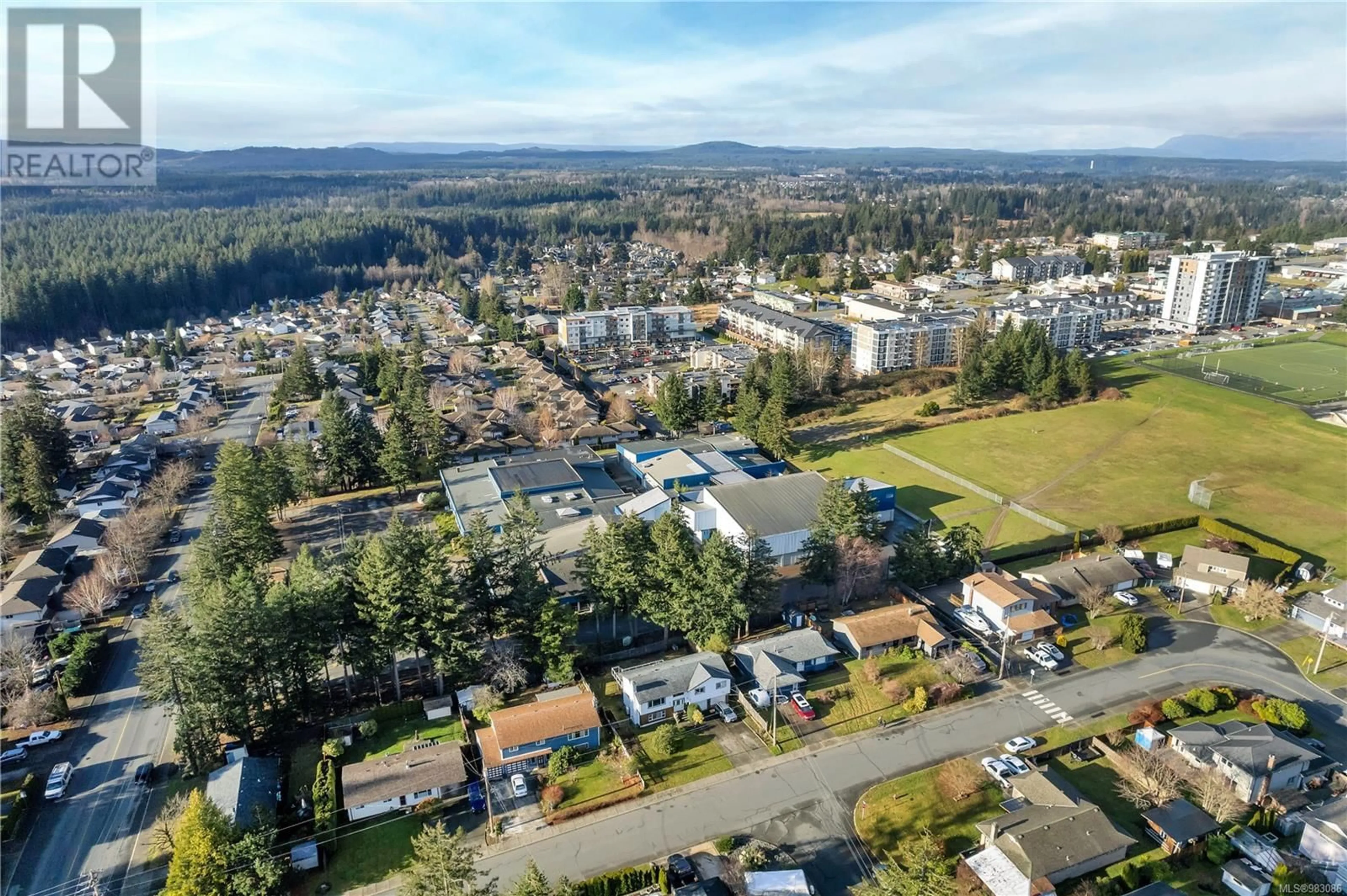 A pic from outside/outdoor area/front of a property/back of a property/a pic from drone, mountain view for 648 Christopher Rd, Campbell River British Columbia V9W6A4