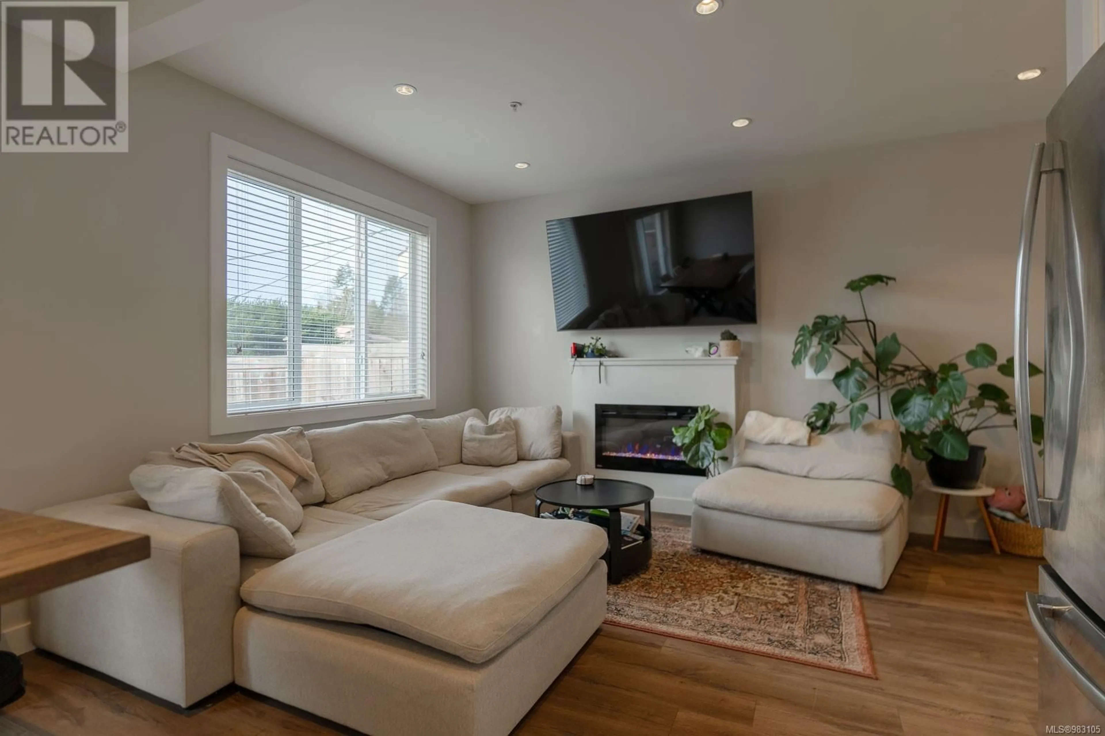 Living room with furniture, wood/laminate floor for 102 6717 Ayre Rd, Sooke British Columbia V9Z0H1